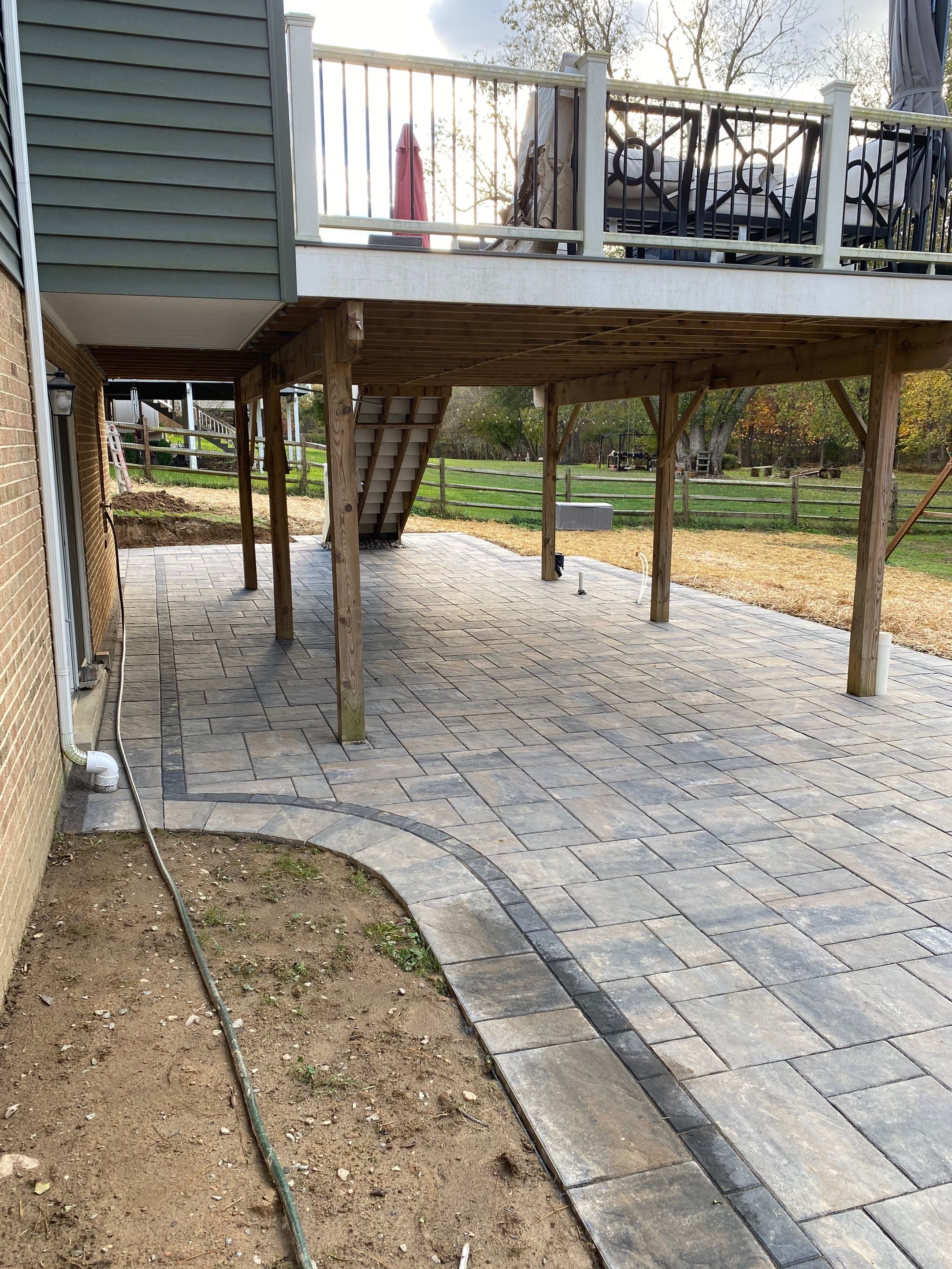 Backyard Transformation using Techo-Bloc Pavers by The Smet Companies, LLC