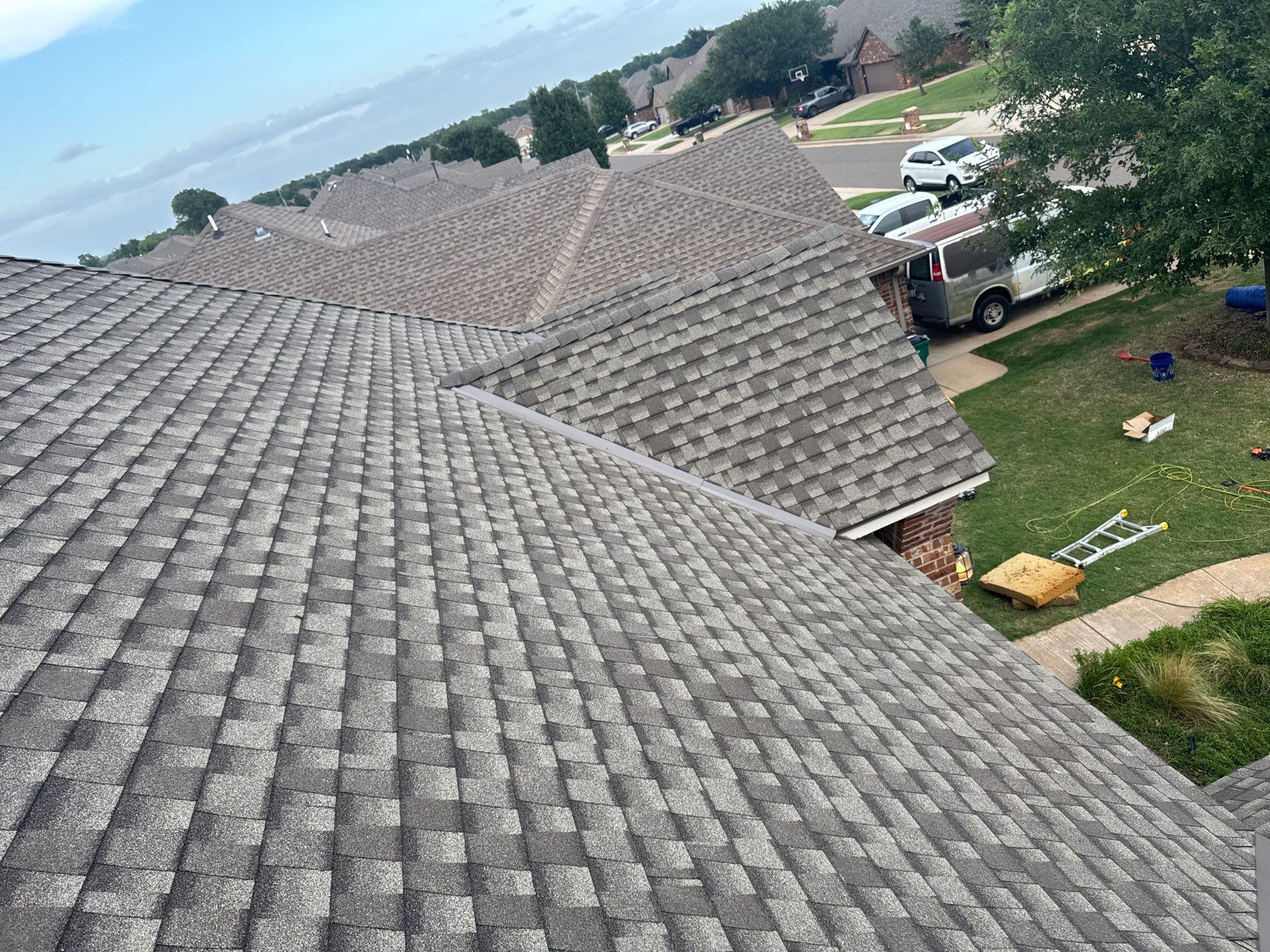 GAF Architectural Shingle Roof Replacement and Decking Repair in Mustang by 5Coat Roofing & Construction