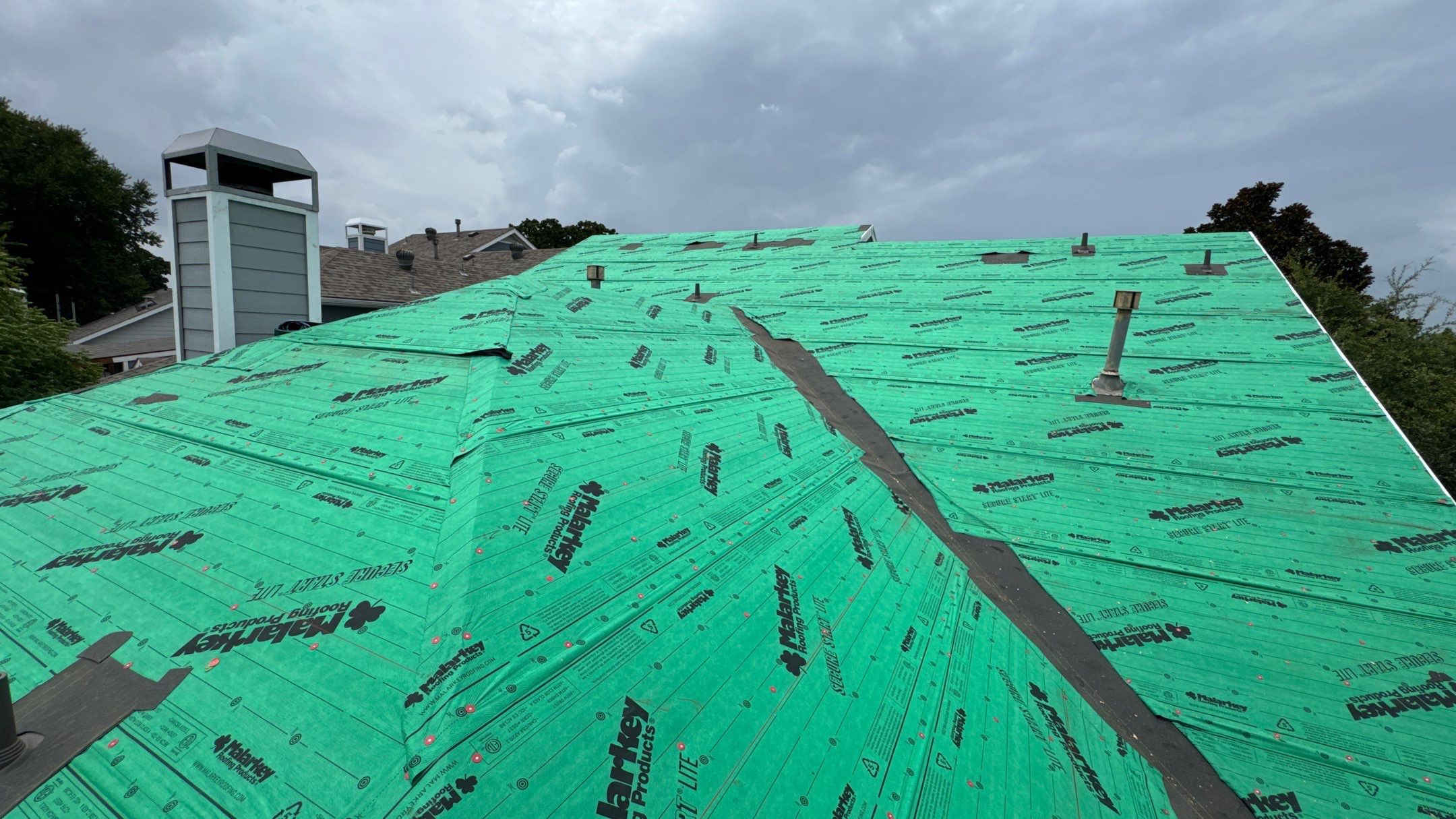 Residential Roofing Installation using Malarkey Secure Choice Roof System by Harvey Roofing & Construction