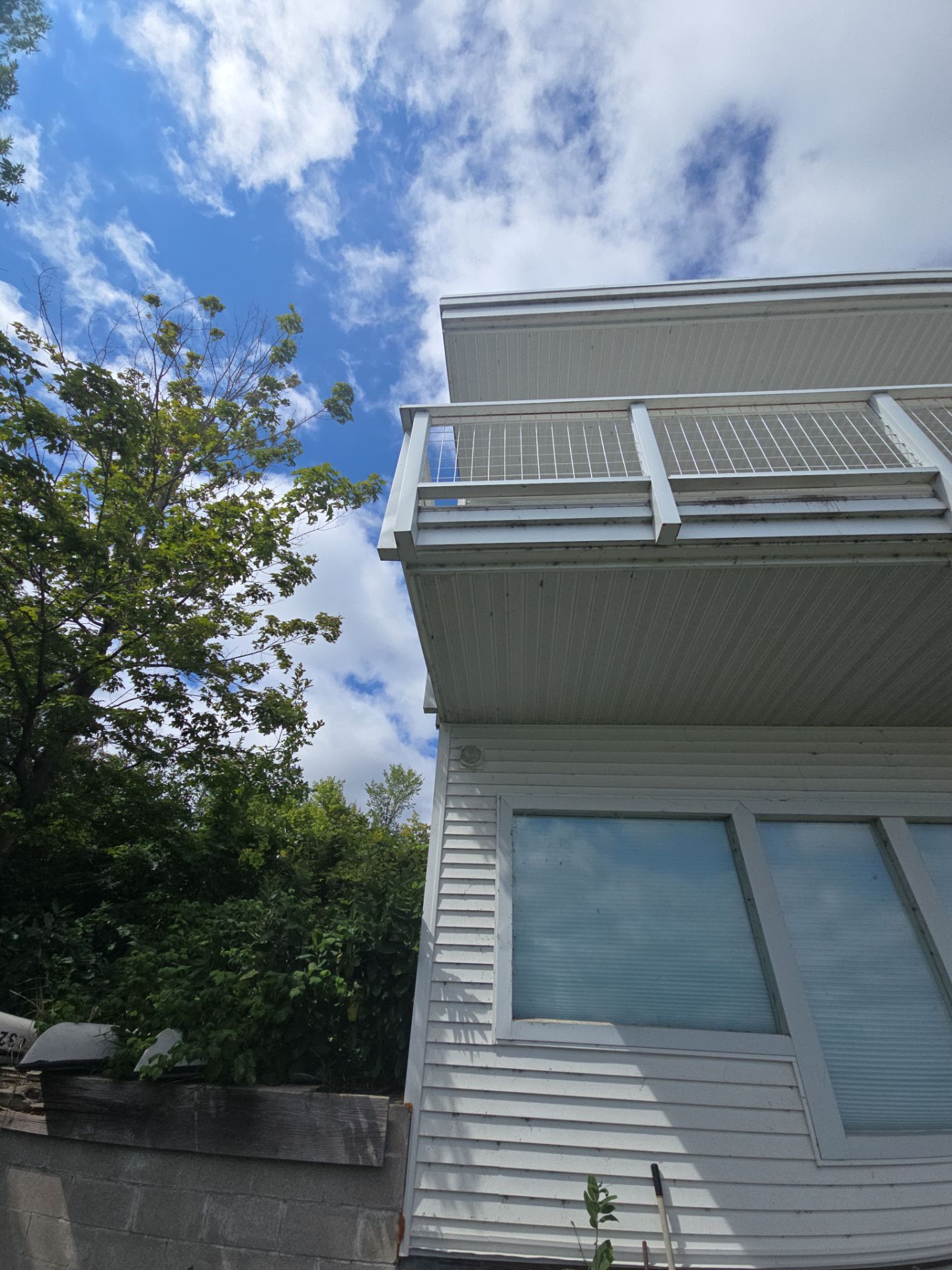 New Gutter System Installation for Suttons Bay Waterfront Home by Rainbow Seamless Systems