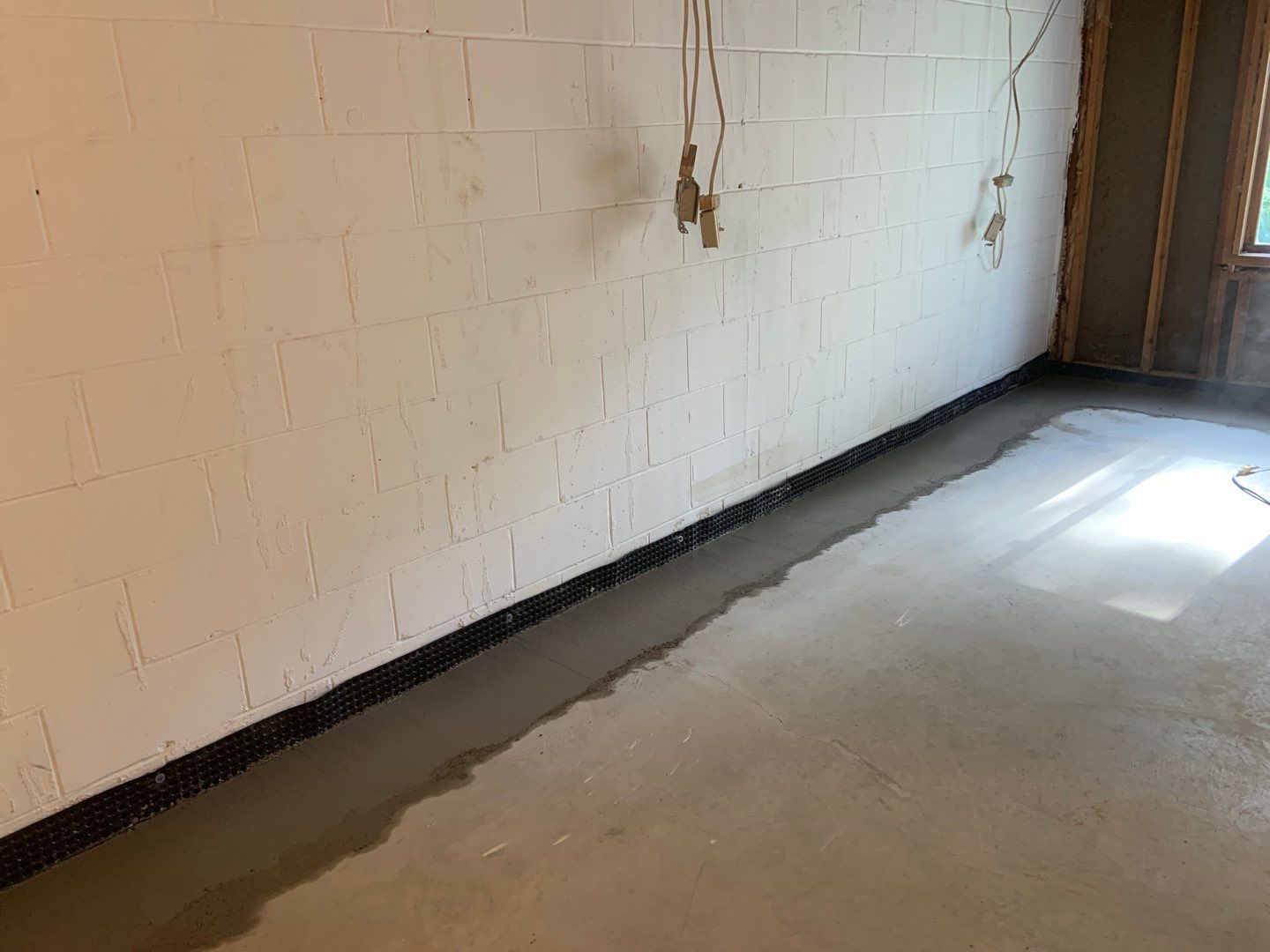 Correcting an Improper Installation for Alan in Chanhassen by Waterproofing Northeast