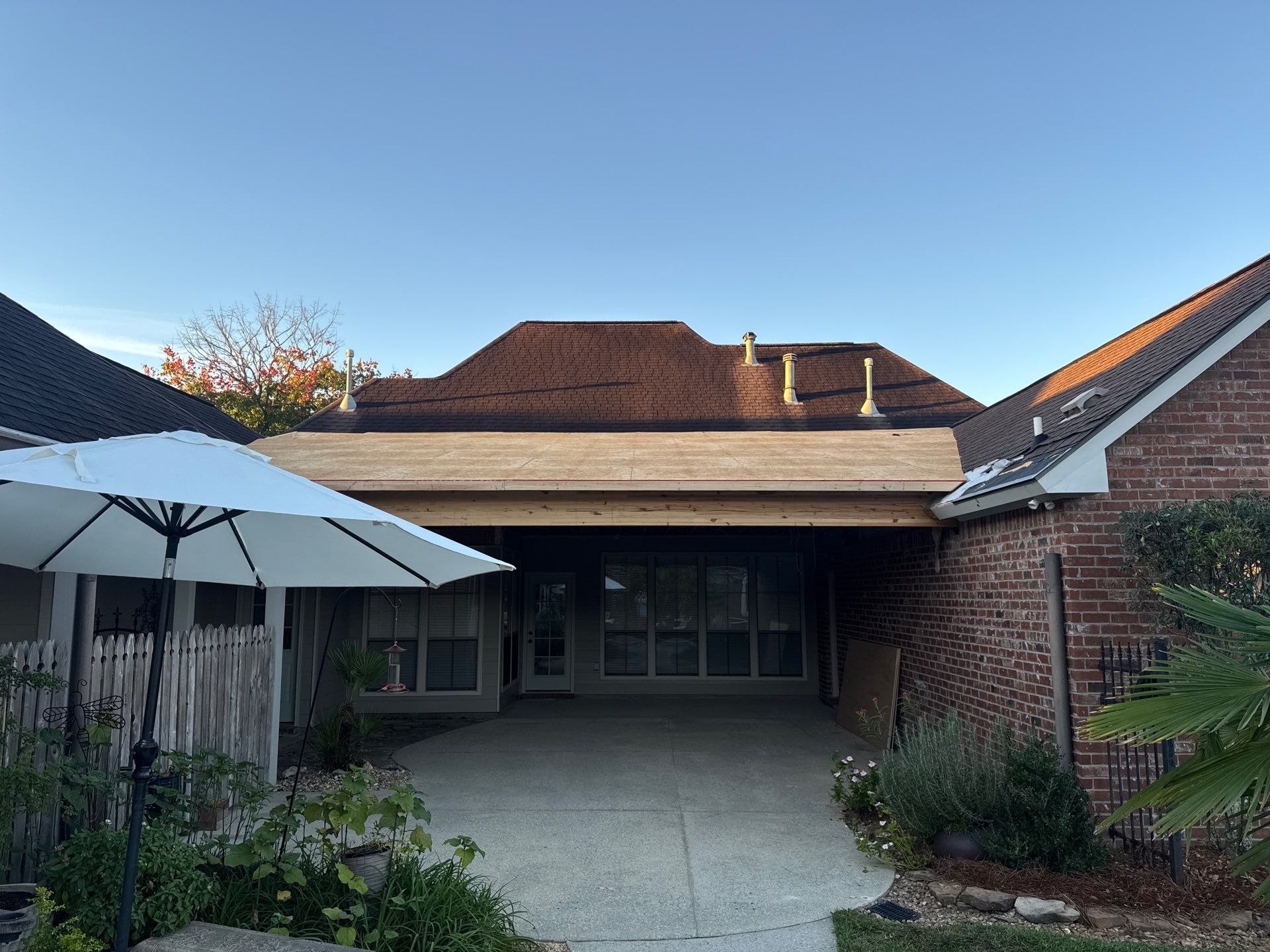 Certainteed Landmark Weathered Wood w patio extension by Top Team Roofing & Construction