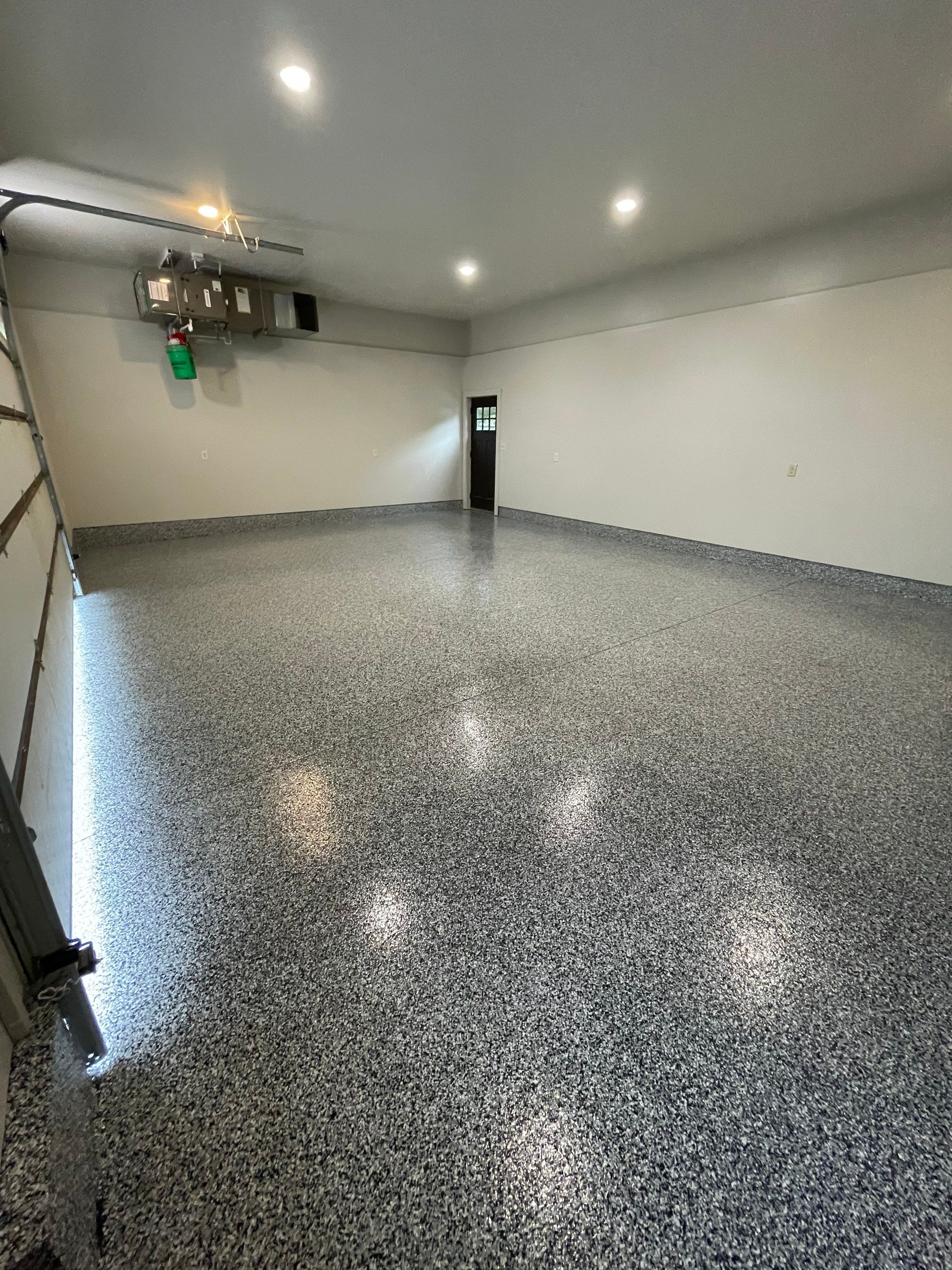 Domino Flake Floor Coating and Crack Repair in Chancellor by Select Painting, Coatings & Garage Cabinets