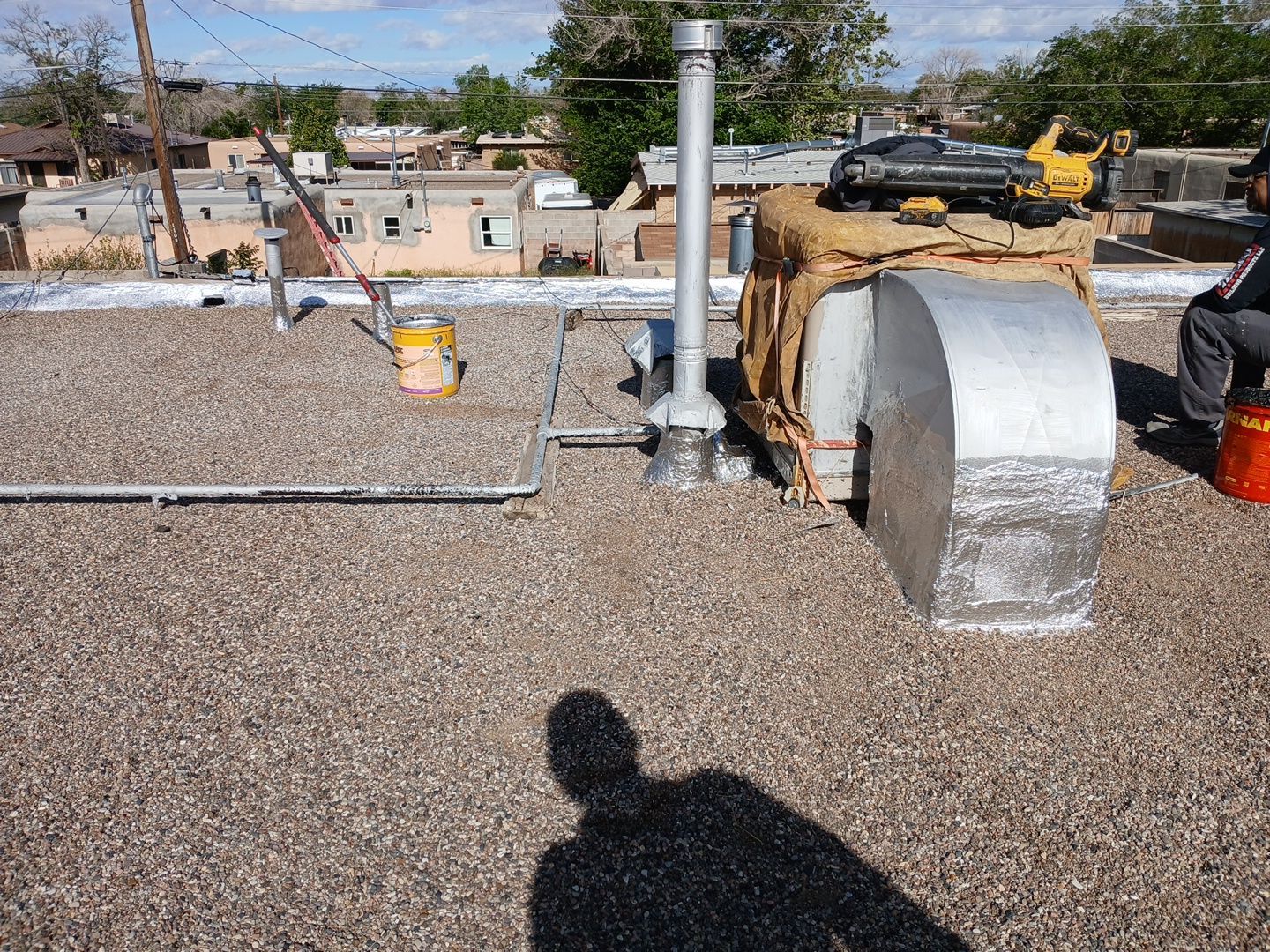 Albuquerque Flat Roof Replacement Using Tan Modified Bitumen Membrane by Doyle Roof Masters Inc