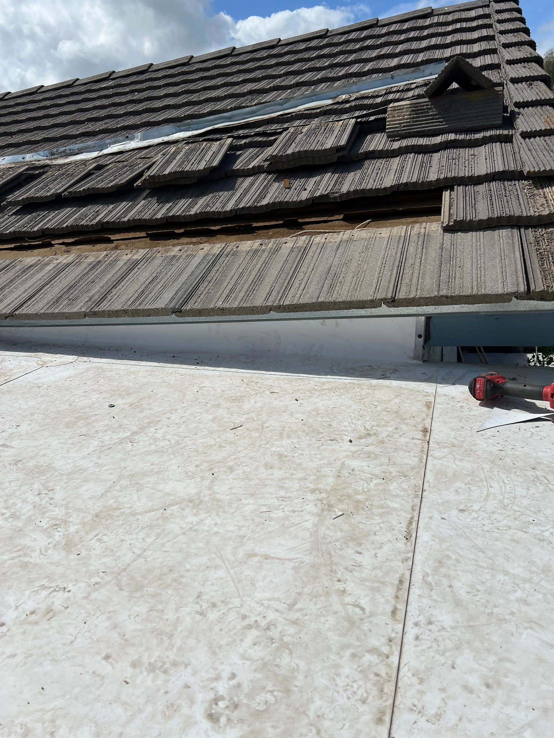 Single-ply roofing system on porch using TPO 60 mil by Straight Edge Roofing Inc