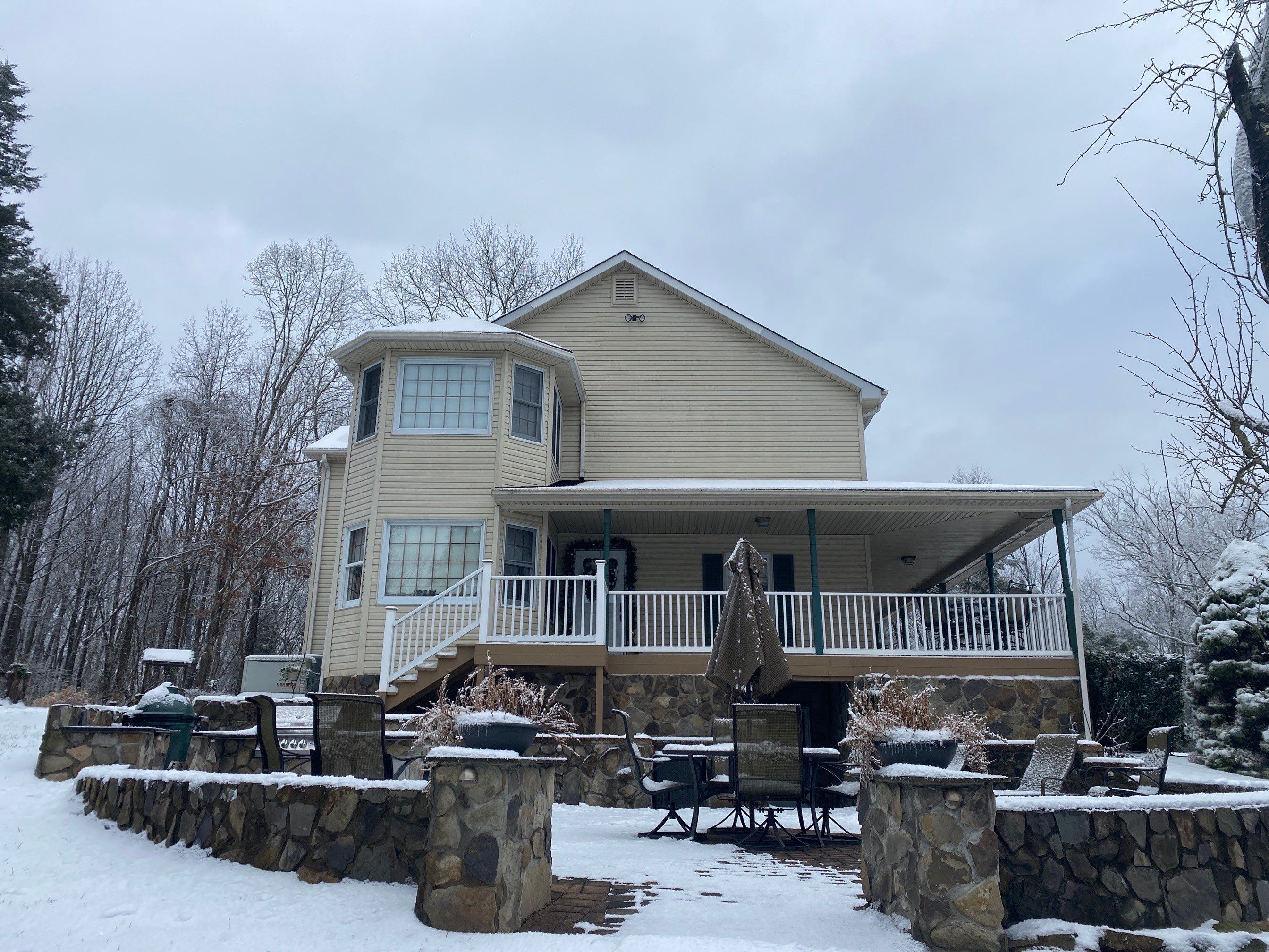 Exterior remodel including window replacement by American Home Contractors