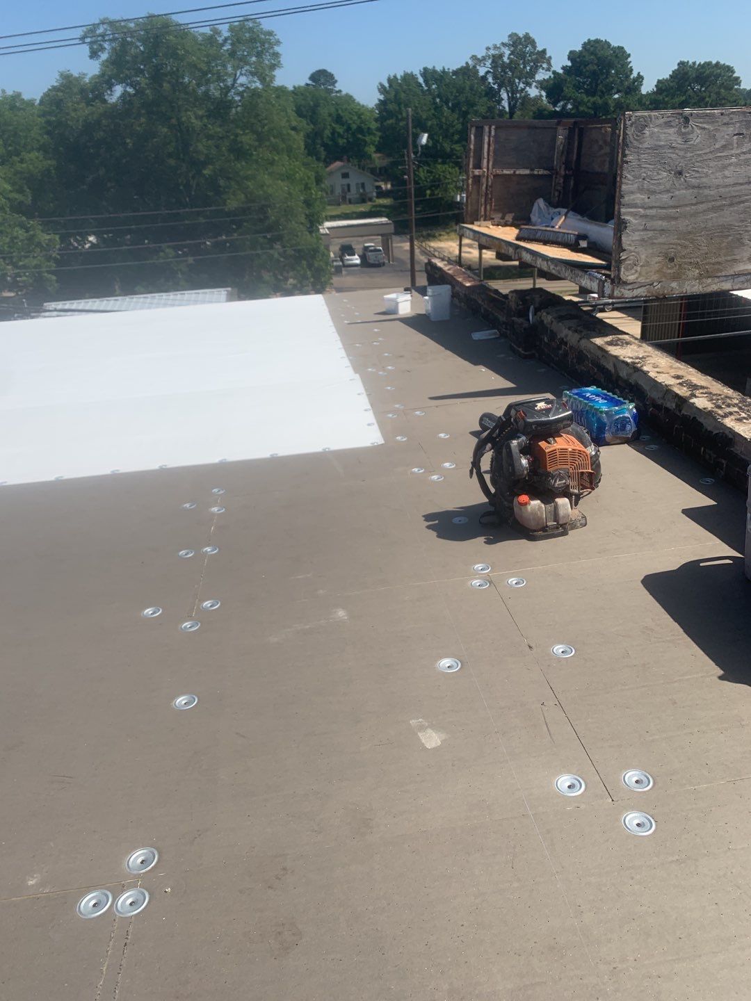 Commercial Roofing Installation in DeQueen, AR, using 50 mil PVC by Hostetler Roofing