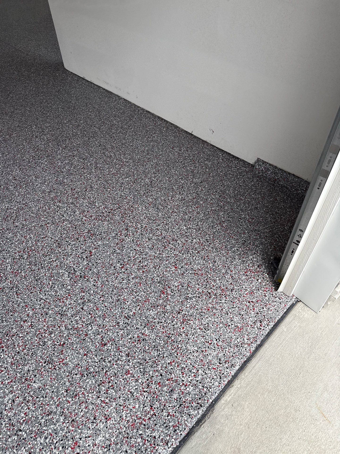 Custom Flake Garage Floor Coating Installation in Altoona by Revival Concrete Coatings