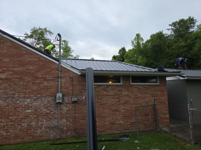 Residential Roofing Installation using Metal