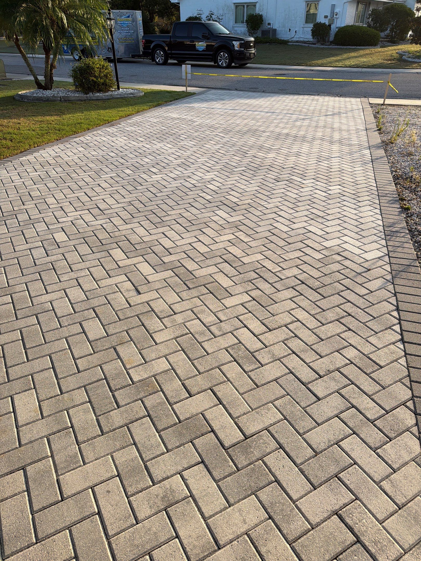 Paver Sealing and Cleaning for Herringbone Driveway in Sun City Center by Supreme Paver Experts