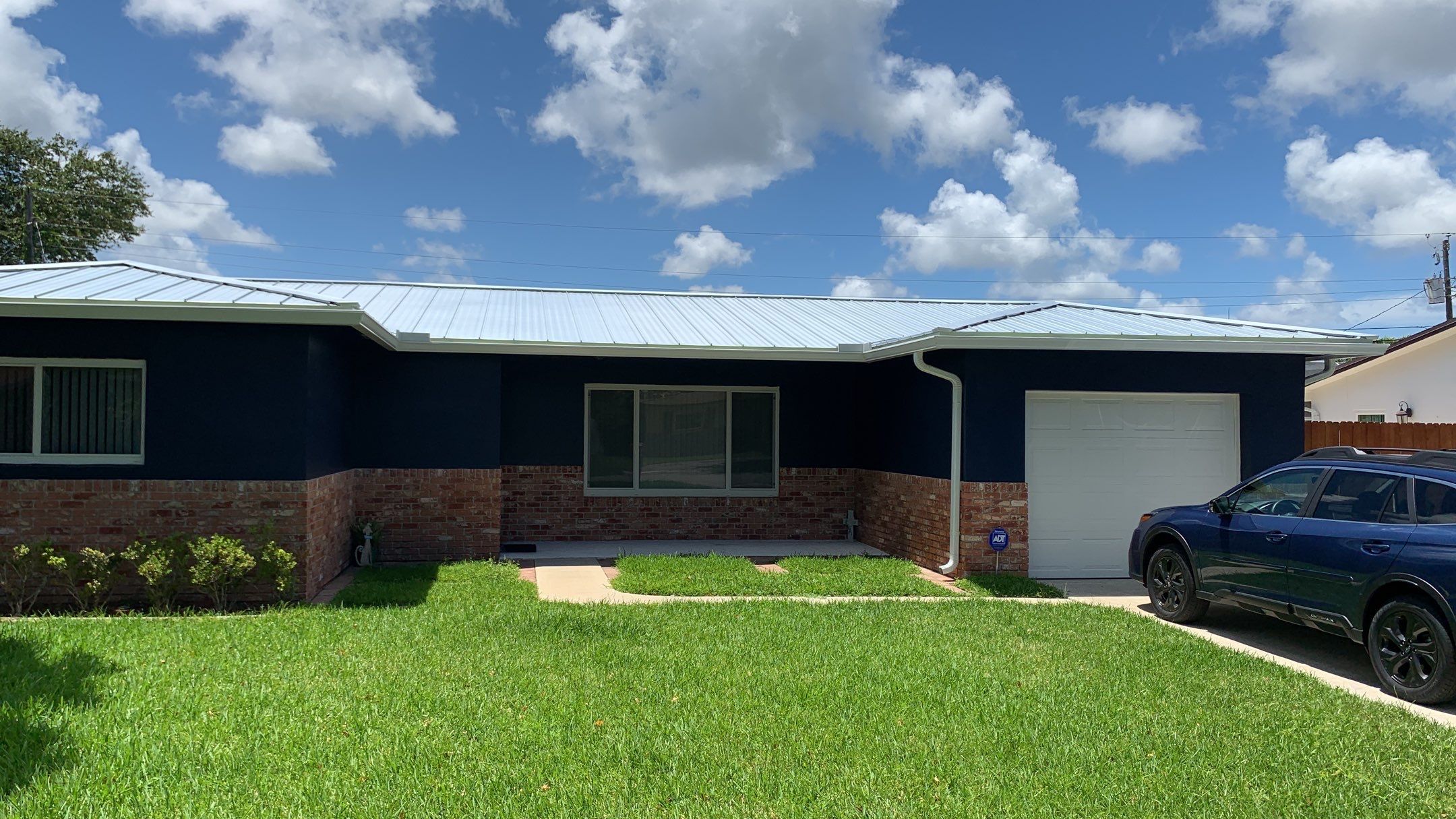 Residential Roofing Installation using 1" Nail strip metal roof by BLUES BROTHERS ROOFING
