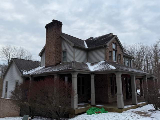 Metal Roof Replacement  by American Home Contractors