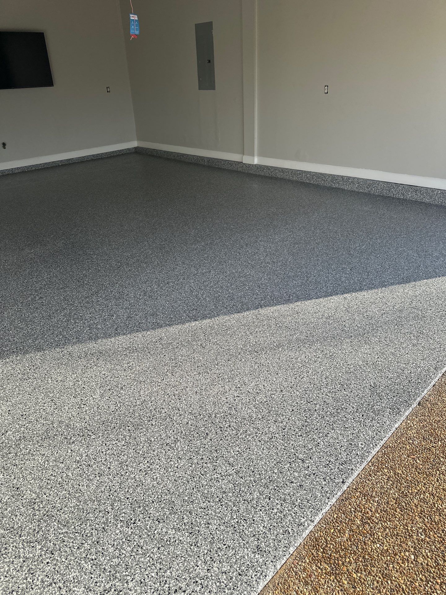 Garage Floor Coating using Wombat by My Garage Floor Guys