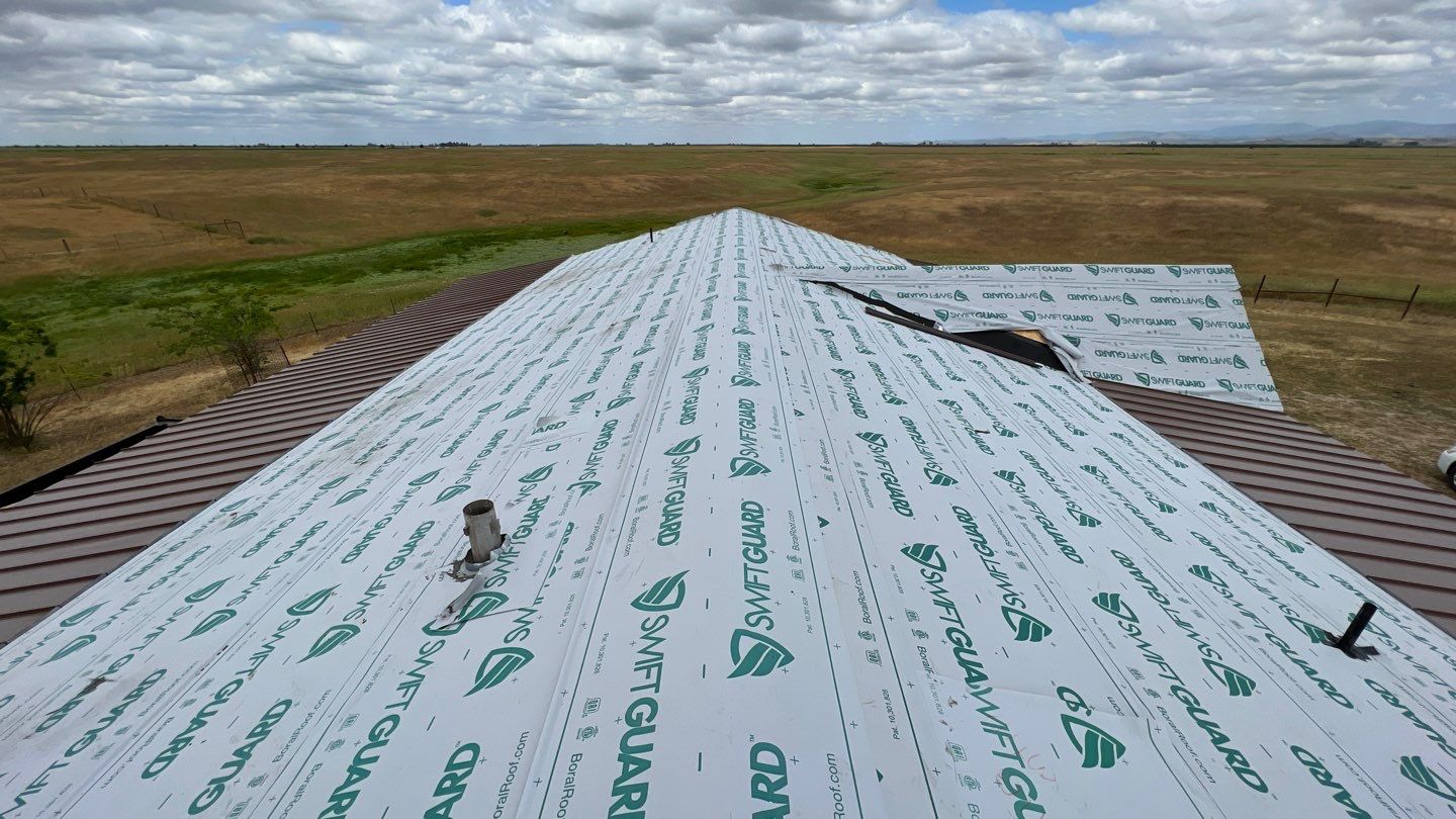 Metal roofing installation using Standing seam metal roofing system by Straight Edge Roofing Inc