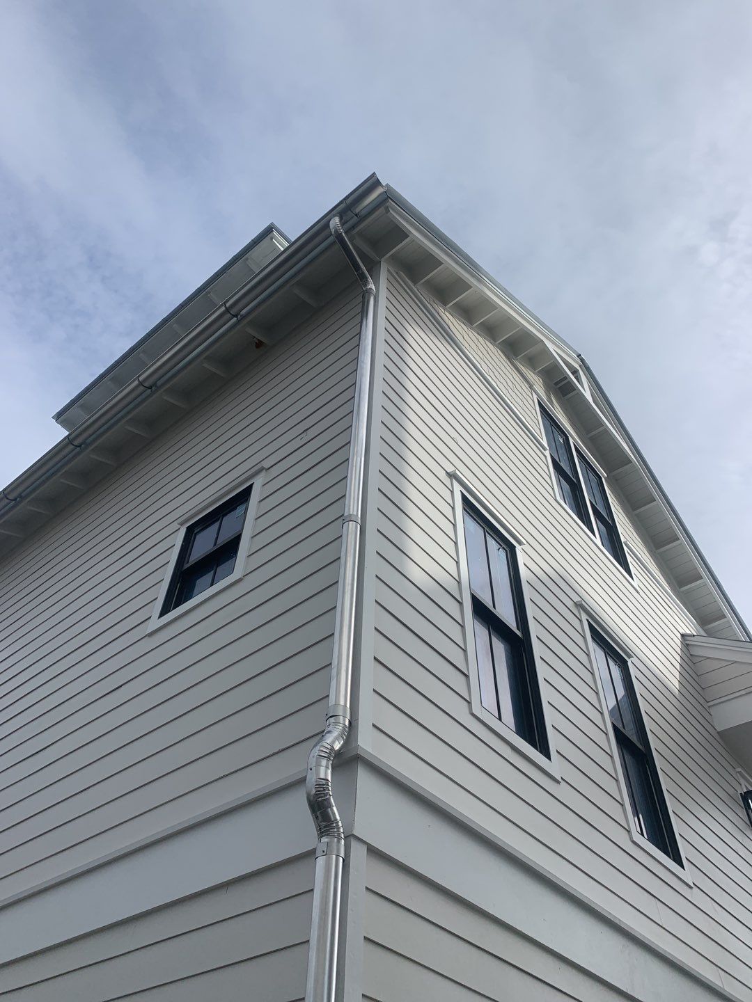 Half-Round Gutters in Galvalume Color in Santa Rosa Beach FL by Gutter Professors