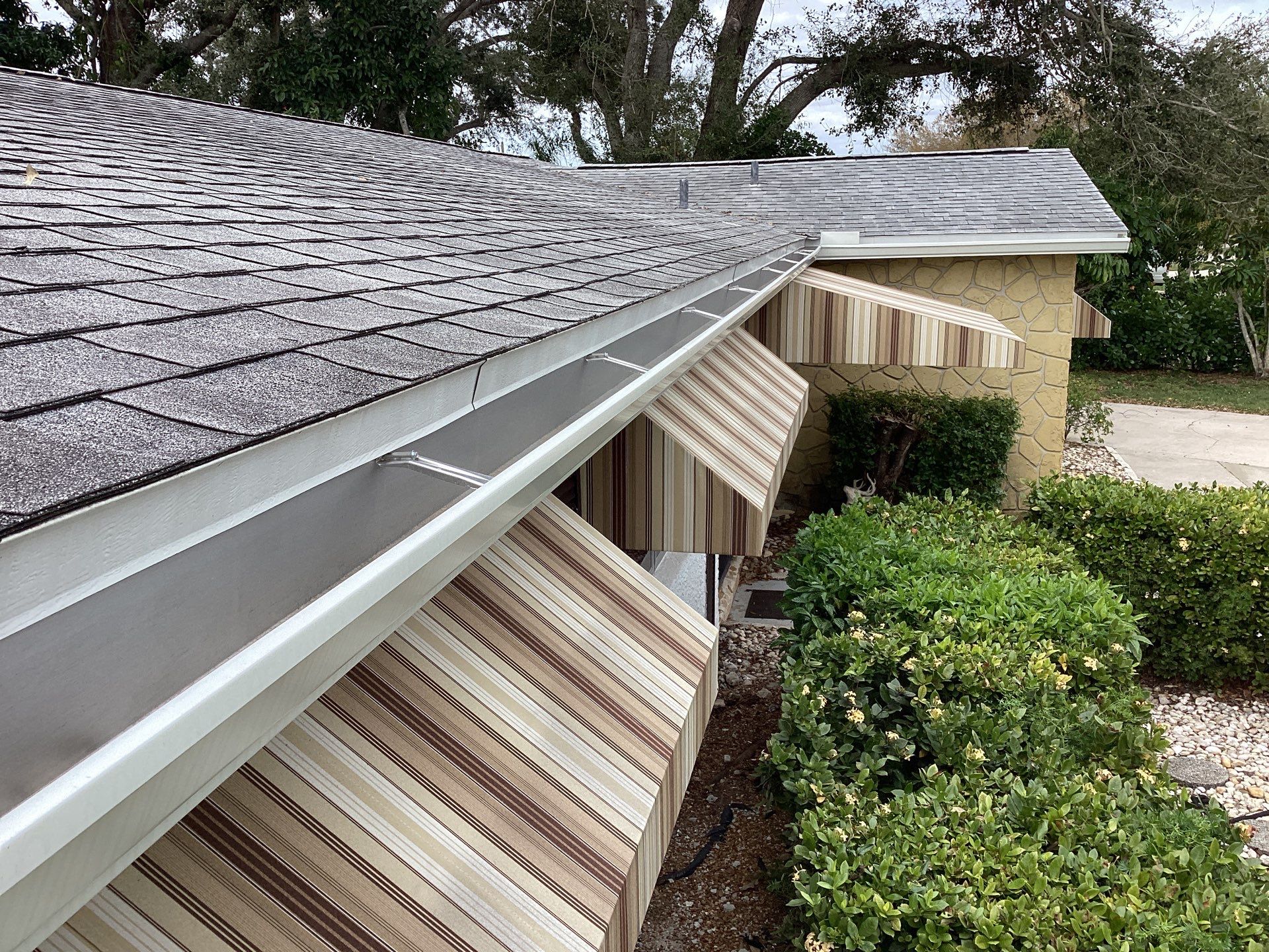 Aluminum Seamless Gutters and new Splash Guard Gutters in Fort Myers by Gutter Professors