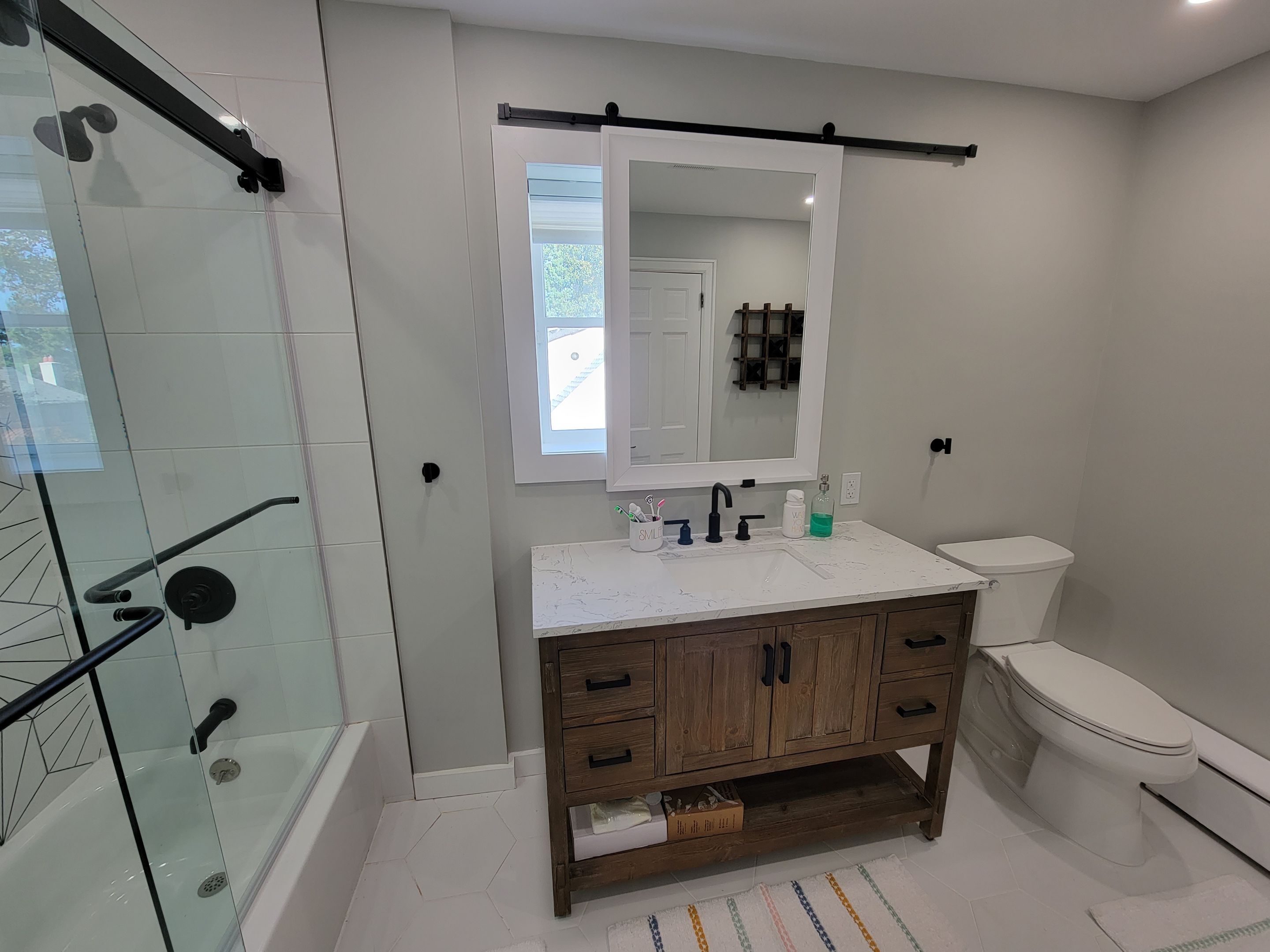 Kids bathroom Upgrade by Cedar Contractors Group, Inc.