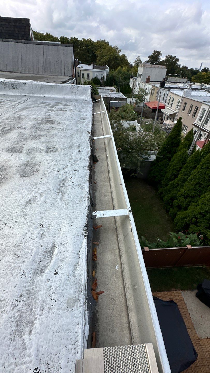 Long Gutter Replacement, Queens NYC by Above All Gutters