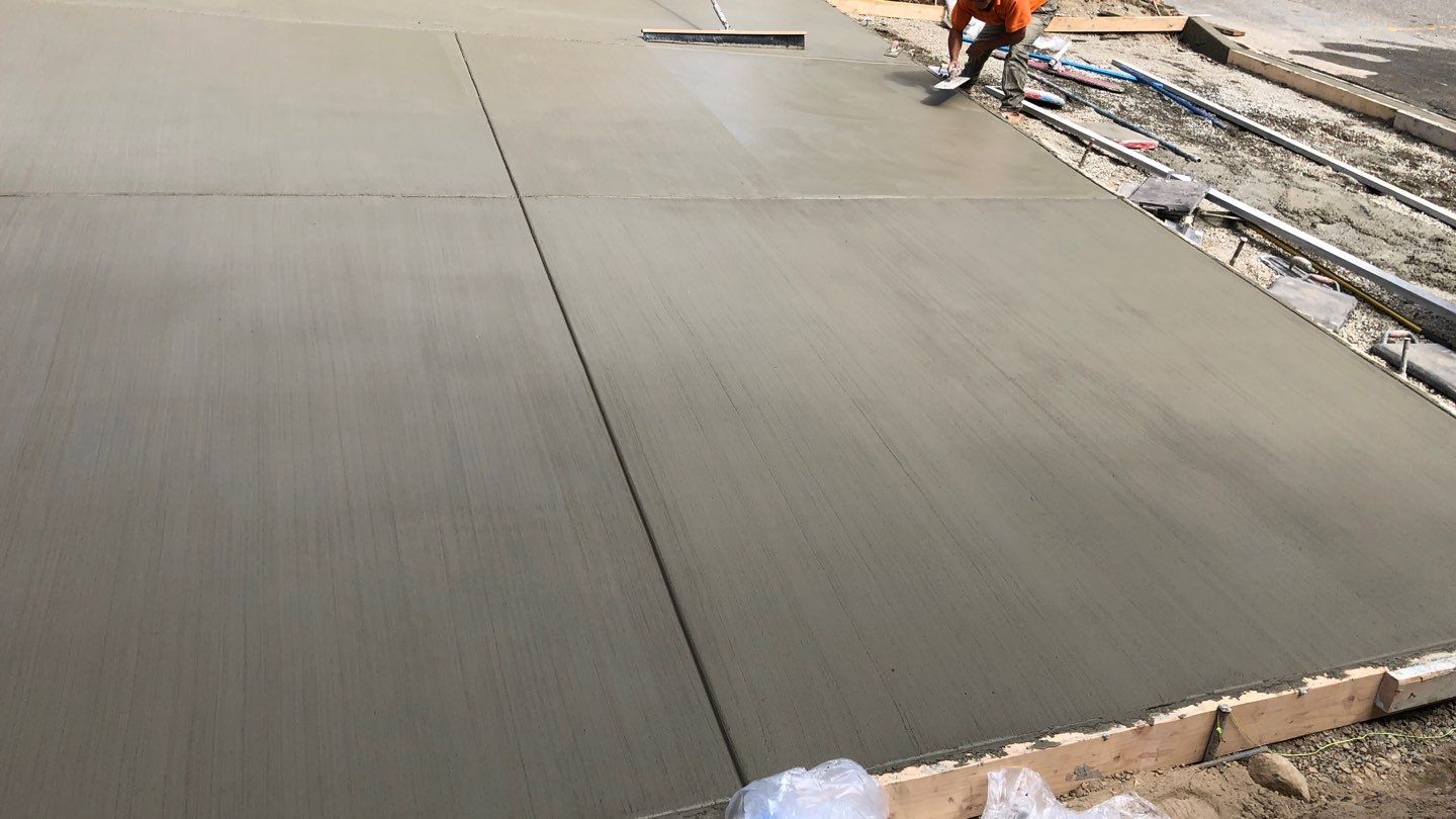 Bruce | Broom Finish Driveway, Concrete Project by Jireh Asphalt & Concrete Inc 