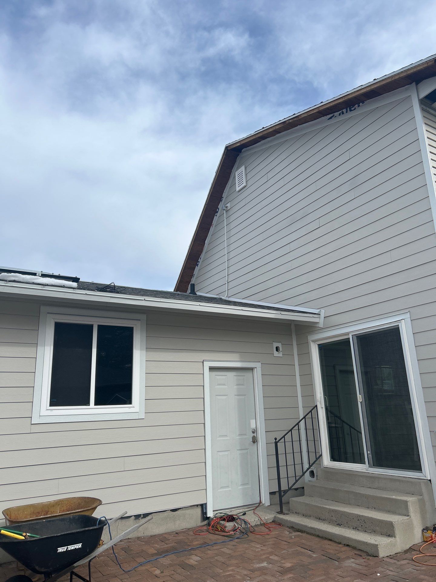 Sandy | Strategic Hardie & Vinyl Integration | Cobble Stone & Desert Sand by Ideal Siding Utah