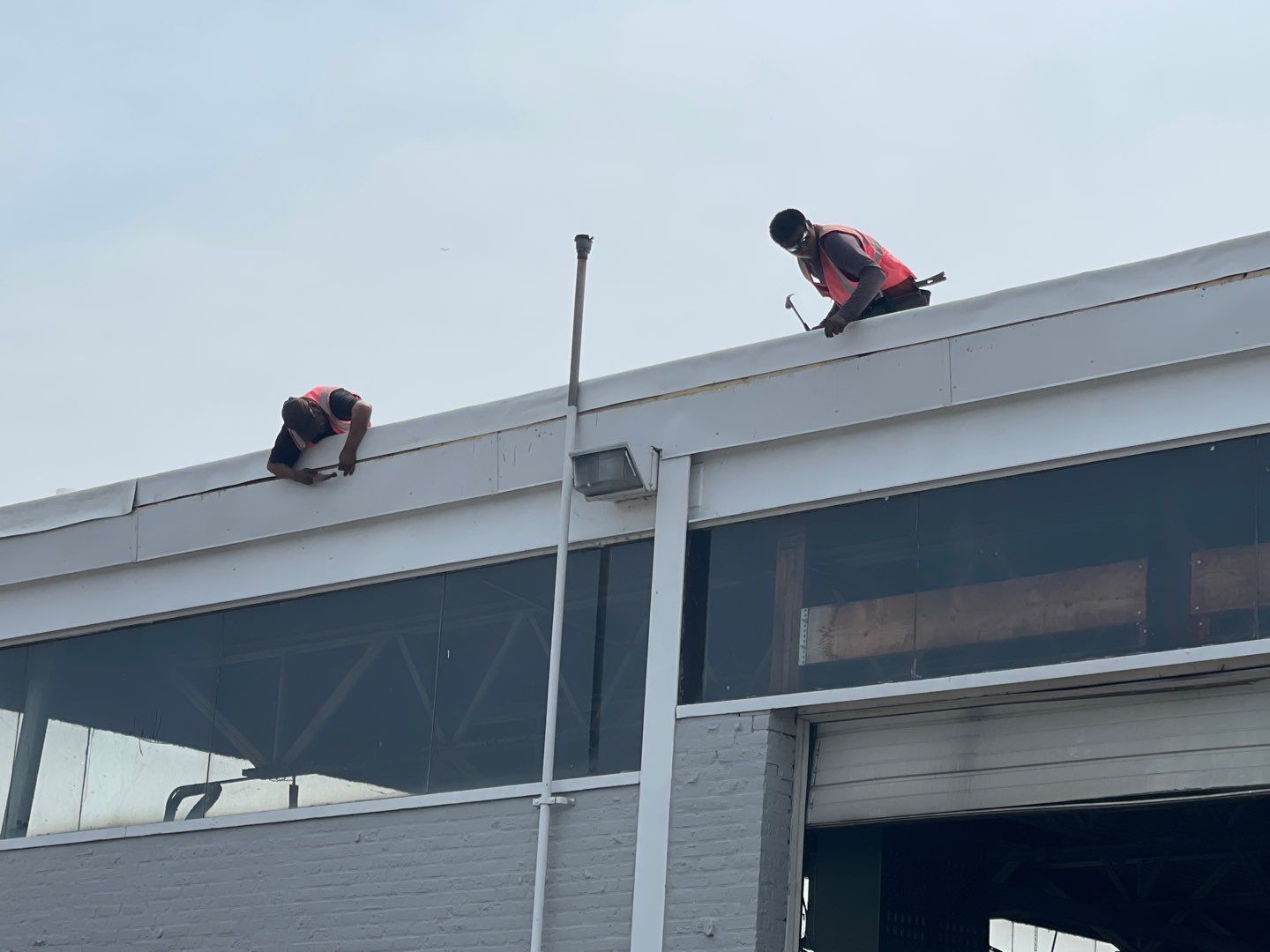 Ford Dealership - Re-Roof by Pink Roofing