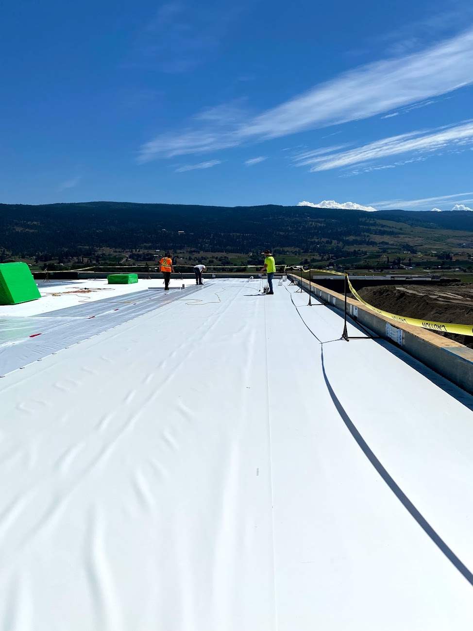 Commercial Roofing Installation using Durolast by Top Notch Roofing Inc