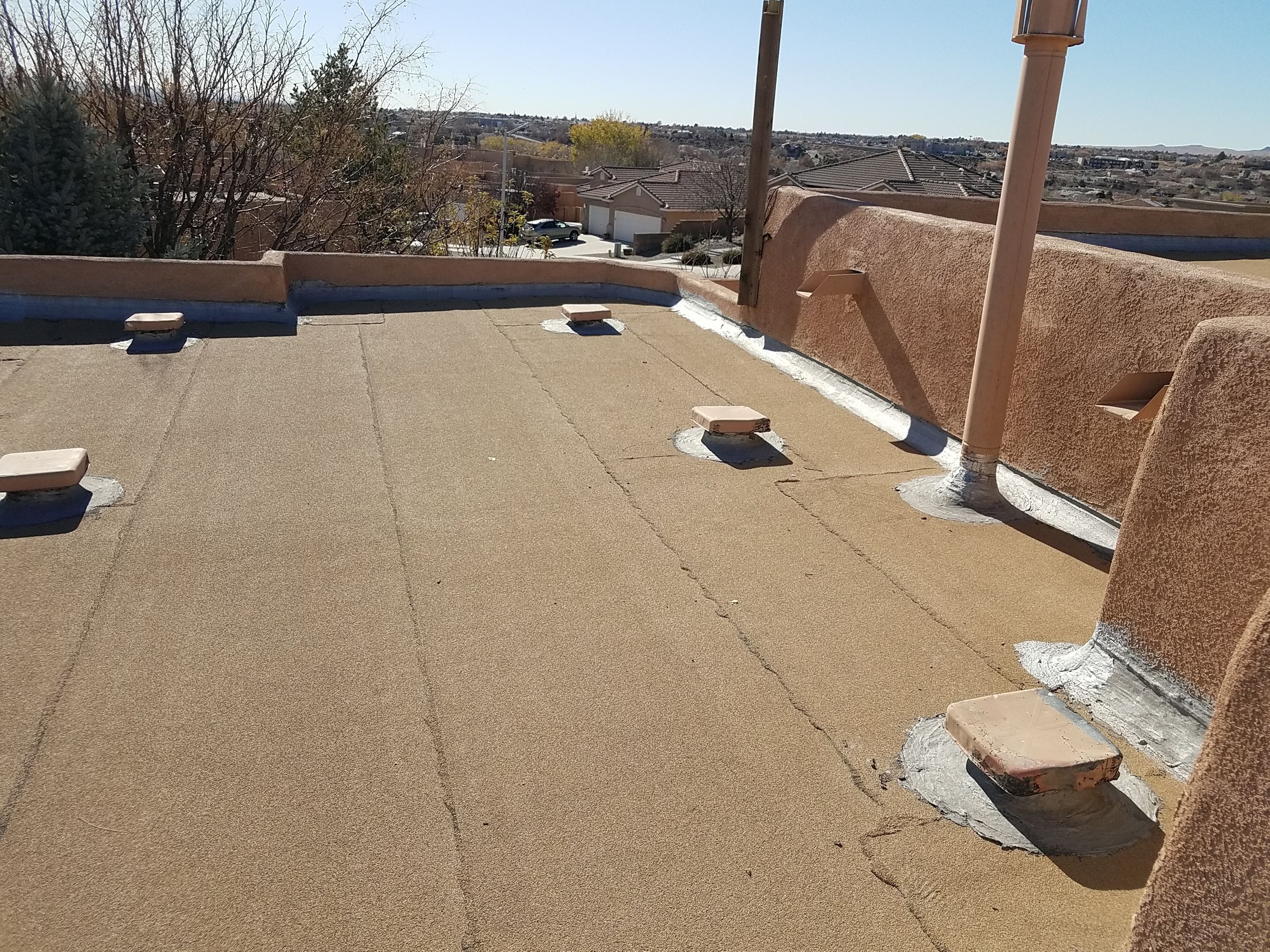 Camelback Rd NW • Albuquerque, NM 87114 *Complete Roof Tune up by Doyle Roof Masters Inc