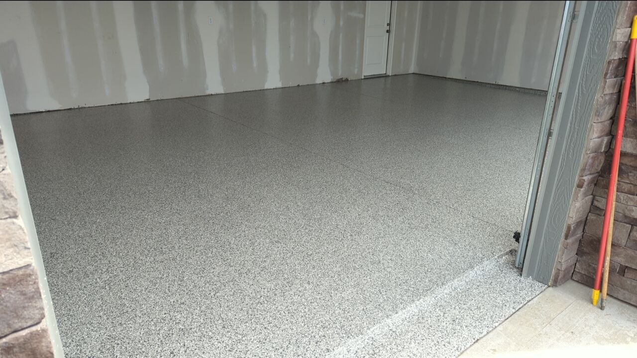 Garage using Slate Stone by Select Painting, Coatings & Garage Cabinets