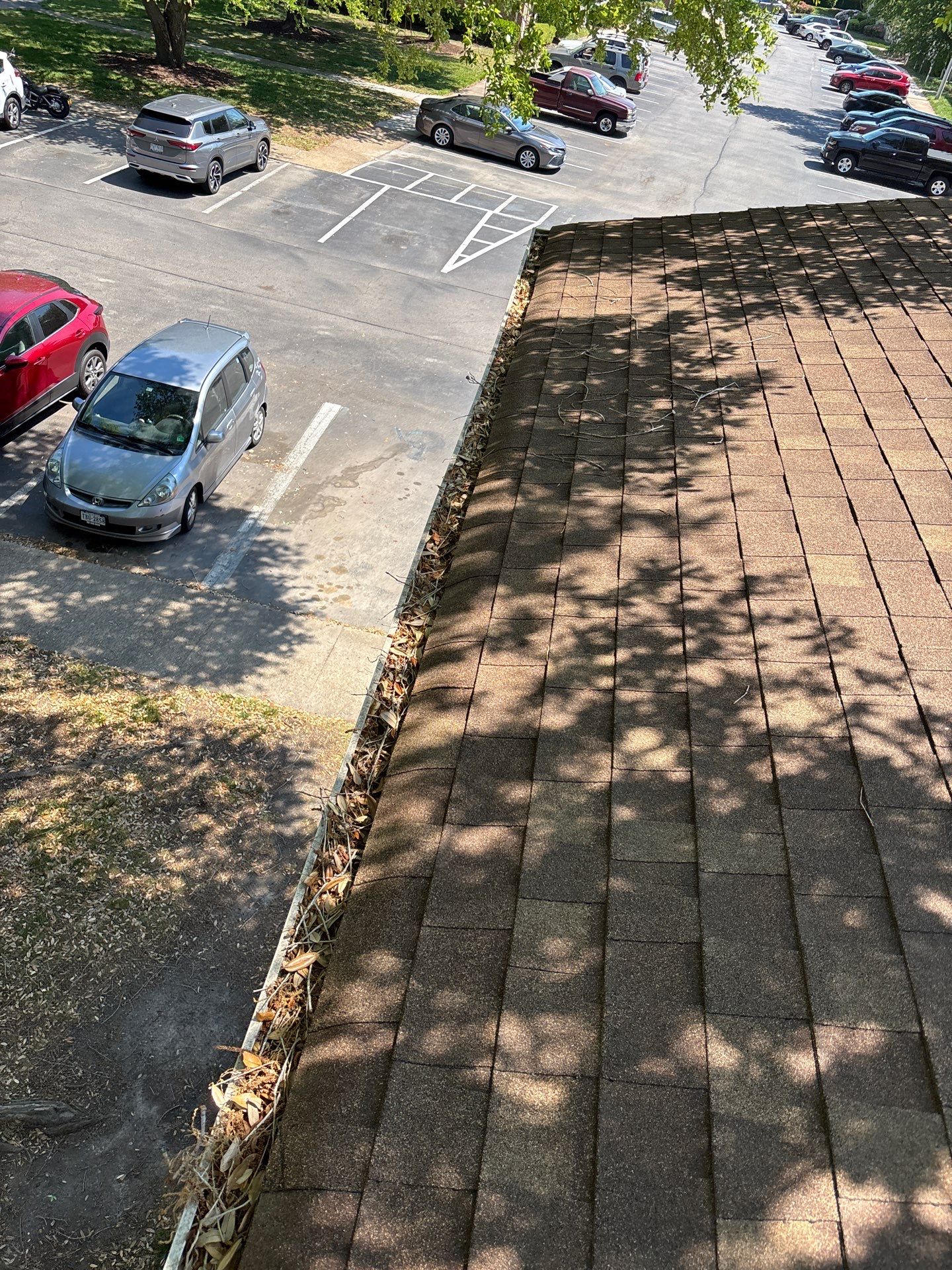 Commercial gutter cleaning Virginia Beach & Norfolk before photo with filled gutters