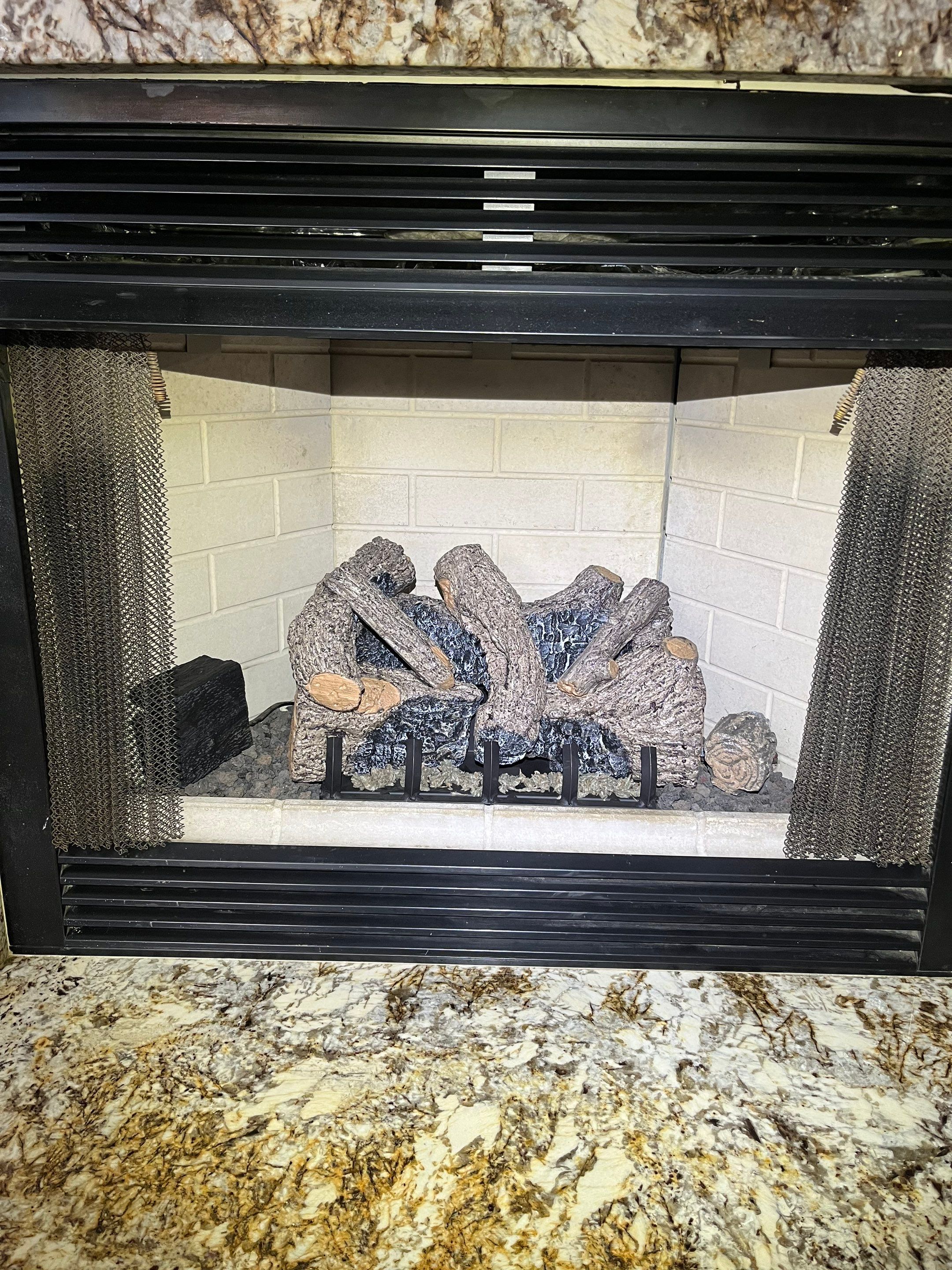 Gas Log Installation in Hampton by Premier Chimney and Roofing