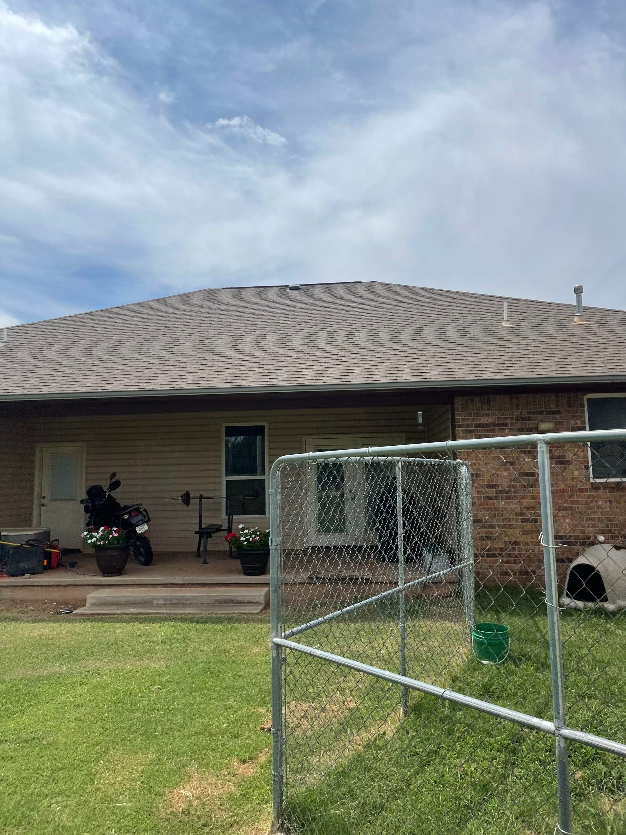 Hail Damage on a Roofing System by Icon Roofing And Construction 