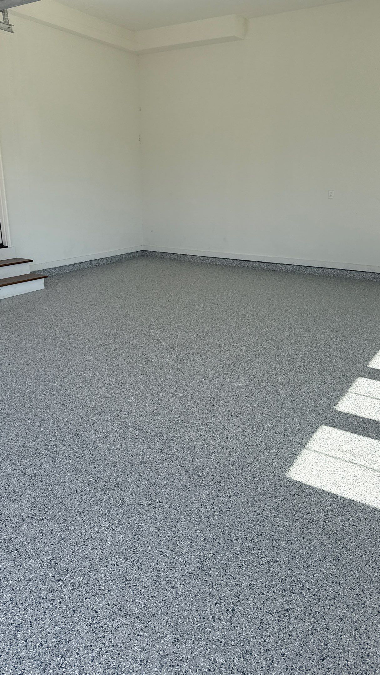Garage Remodel with Custom Cabinets and Epoxy Floors in Overland Park by Banner Garage