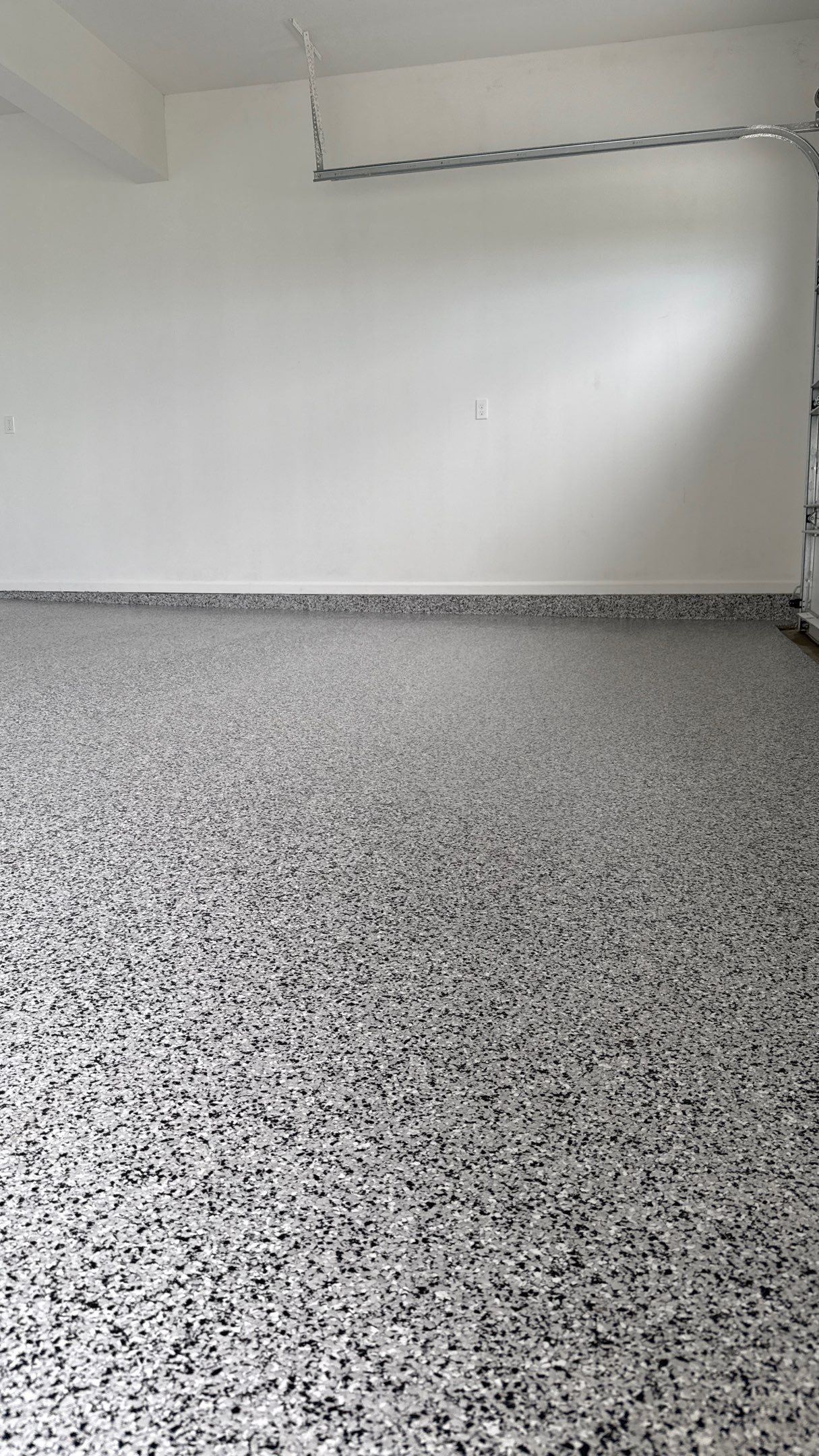 Kurt Got His Floor Done Before Move In, You Should Too  by Banner Garage