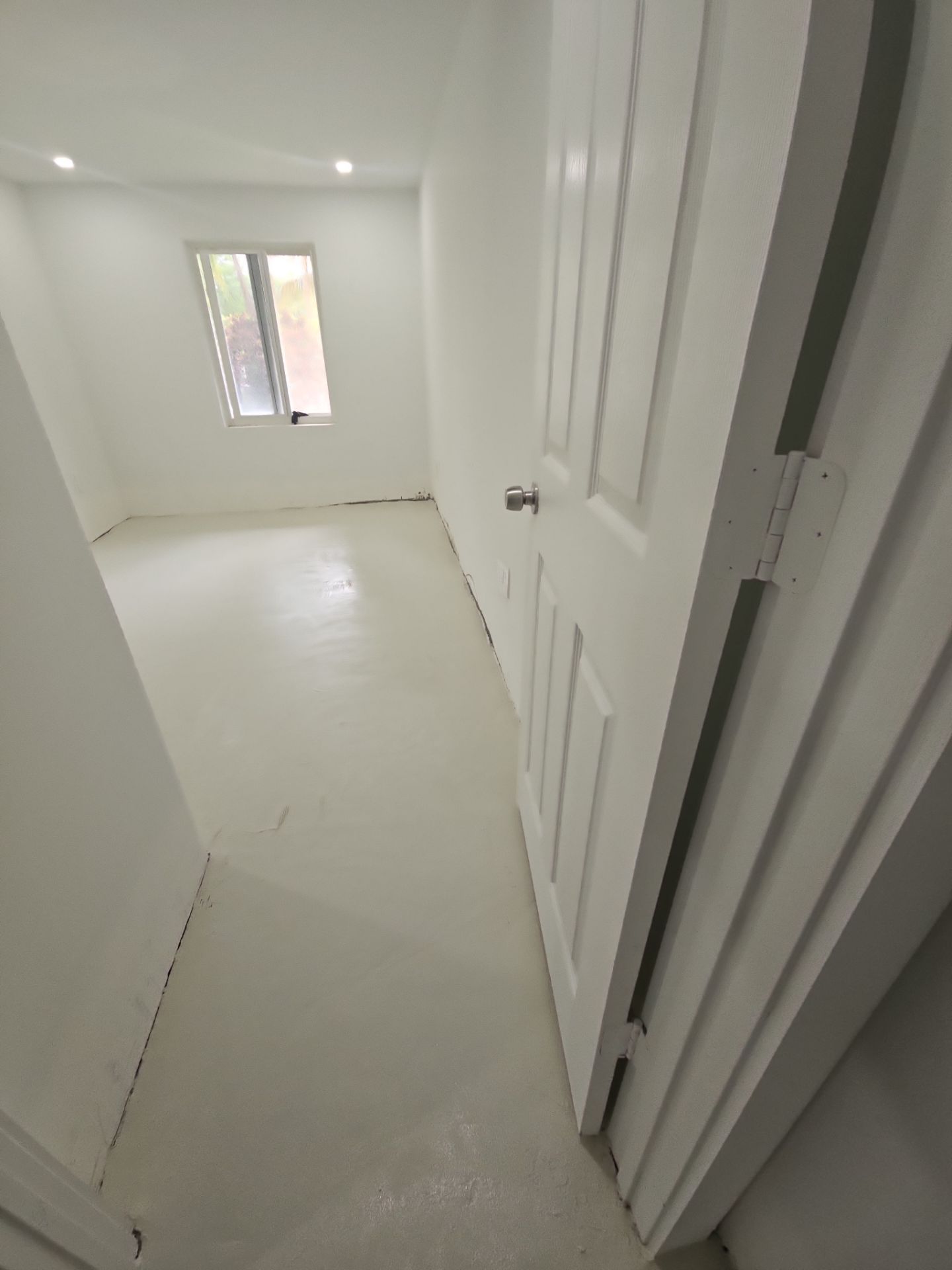 Home Floor Resurfacing w/Microtopping by Seamless Surfaces