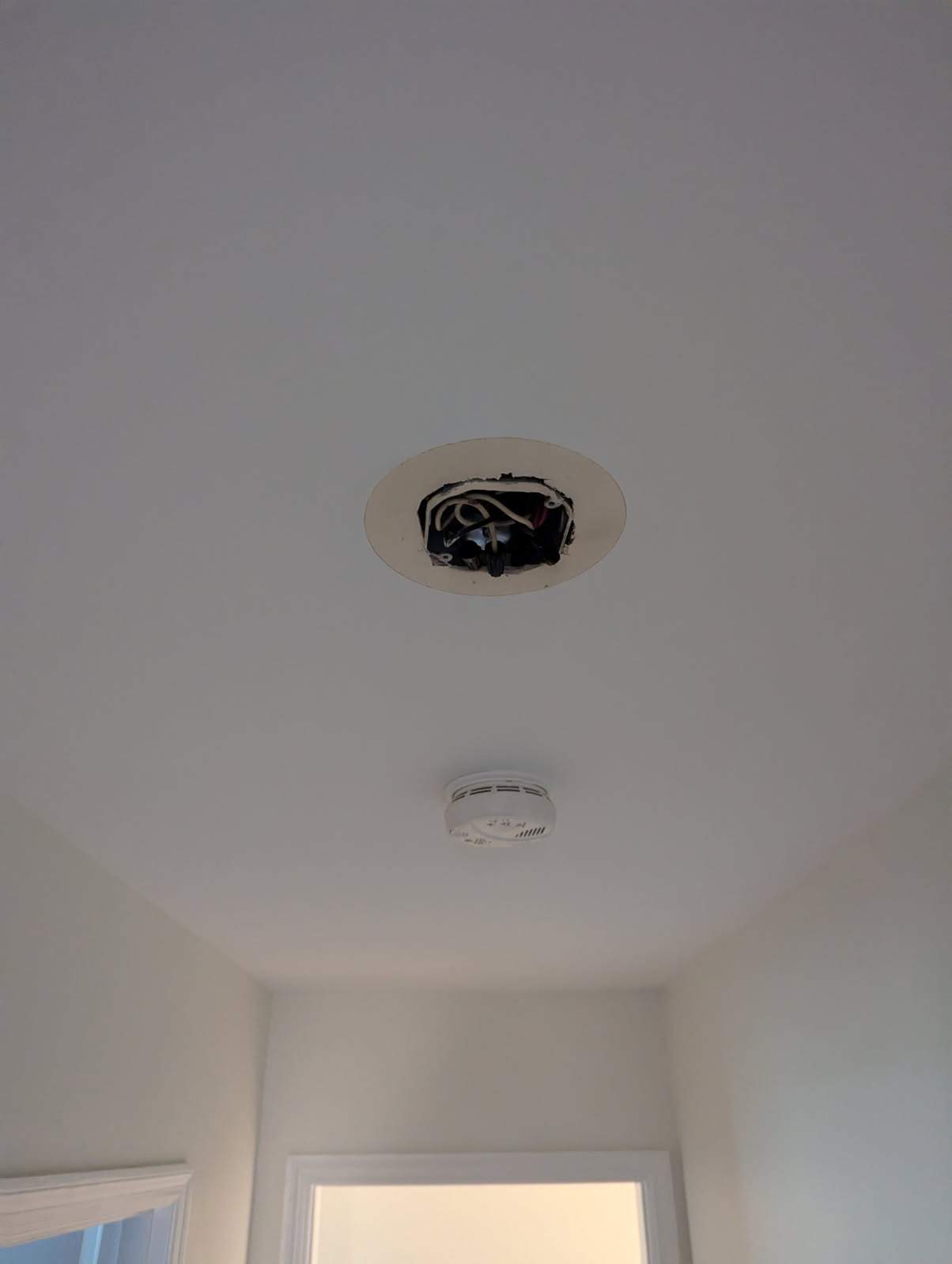 Dual Storm Door & Recessed Lighting Installation – St. Louis, MO by Legendary Services Company LLC.