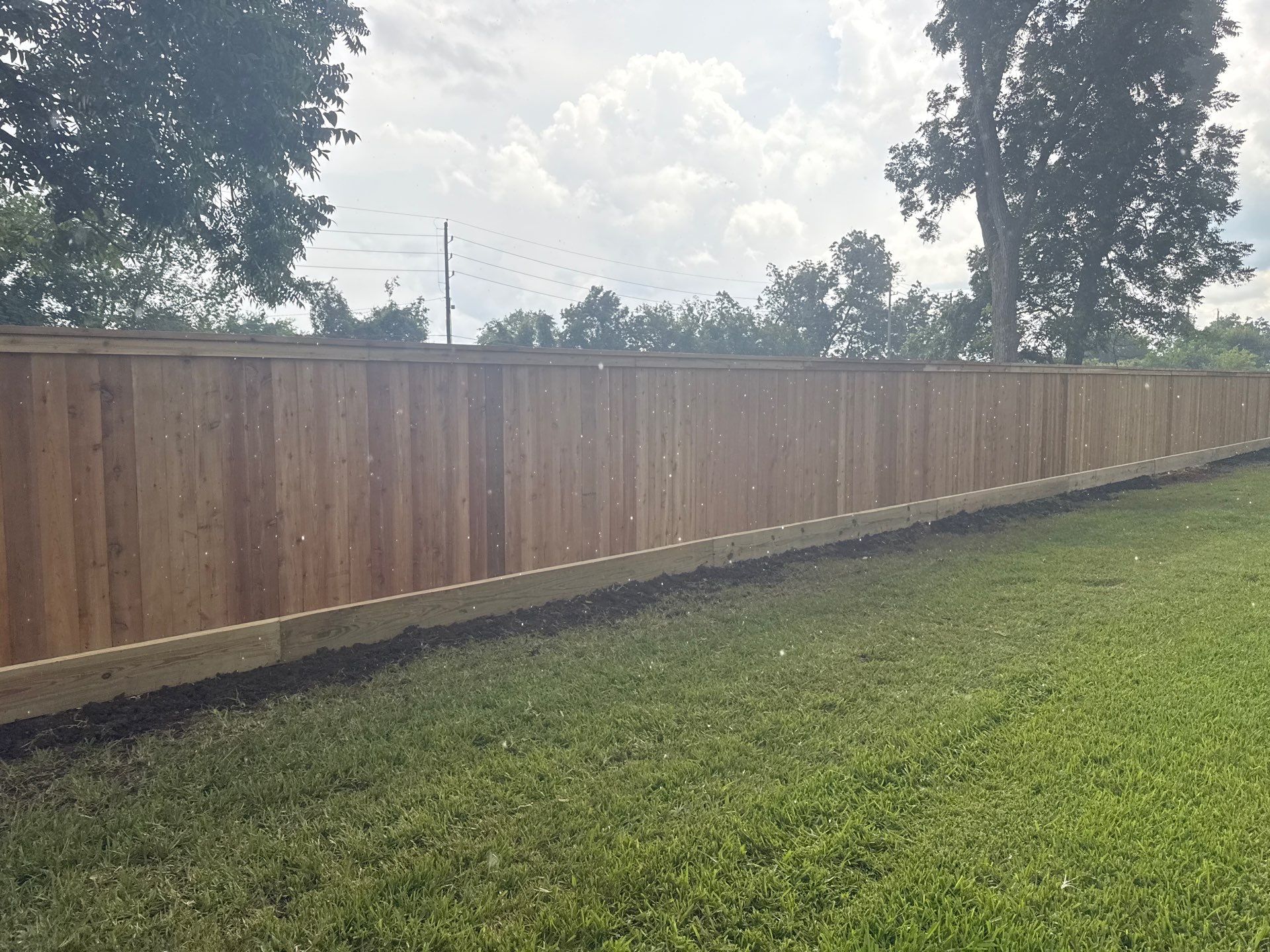 Wood Fence Installation for HOA by Tim's Fences