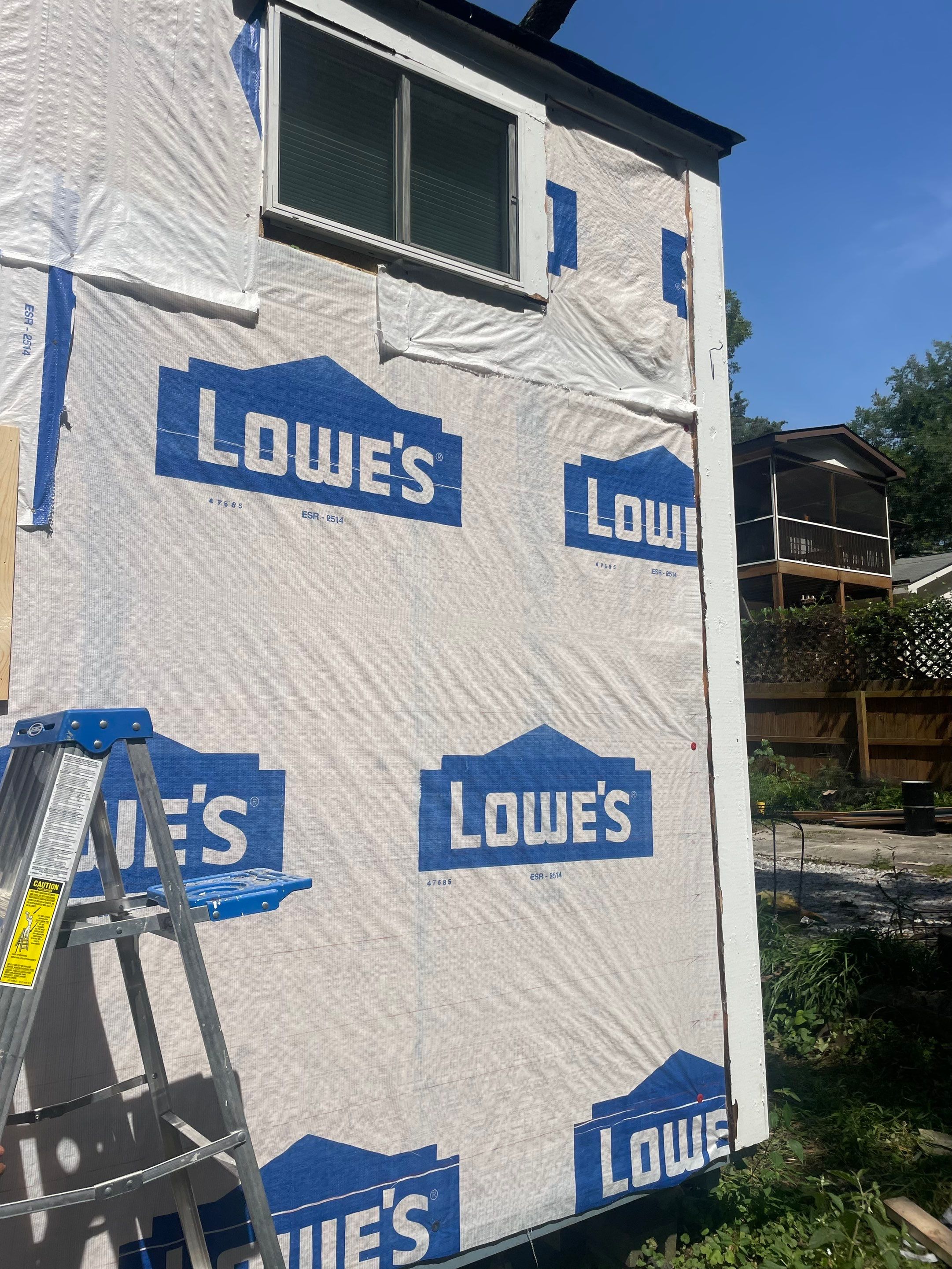 tiny home remodel- siding,paint,roofing by Nailed It Roofing & Remodeling LLC