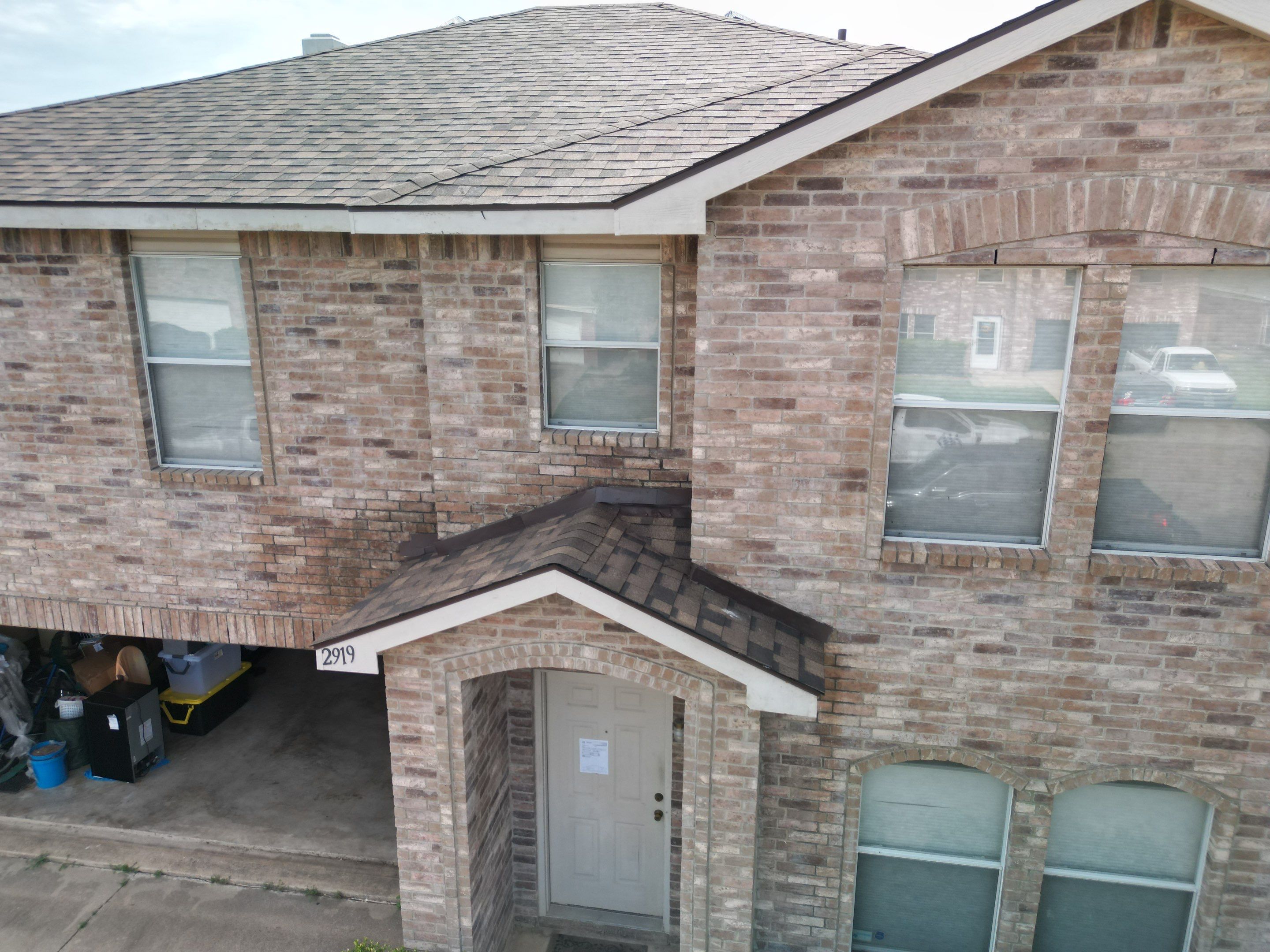 Full Roof Replacement, Chimney Rebuild and Interior Damage Replacement by First United Roofing & Construction