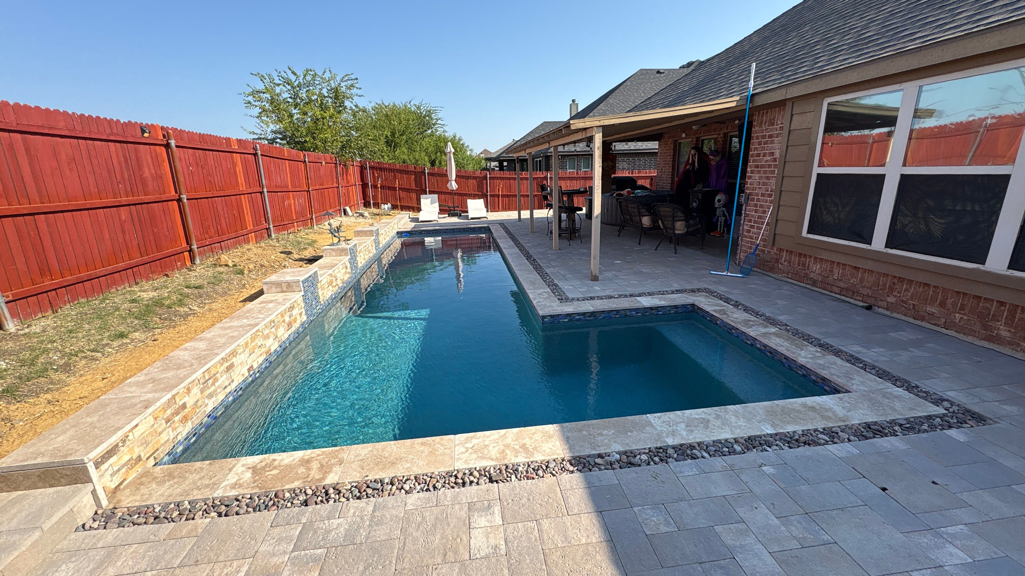 Geometric Pool with Paver Decking by Pinnacle Pools and Spas - DFW