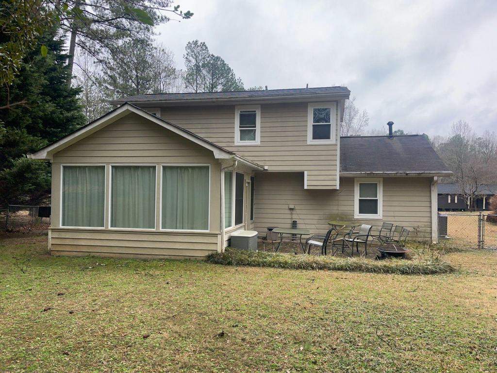 Marietta, GA Siding, Rotten Wood, Front Door, and Gutter Replacement with Exterior Painting by Nelson Exteriors