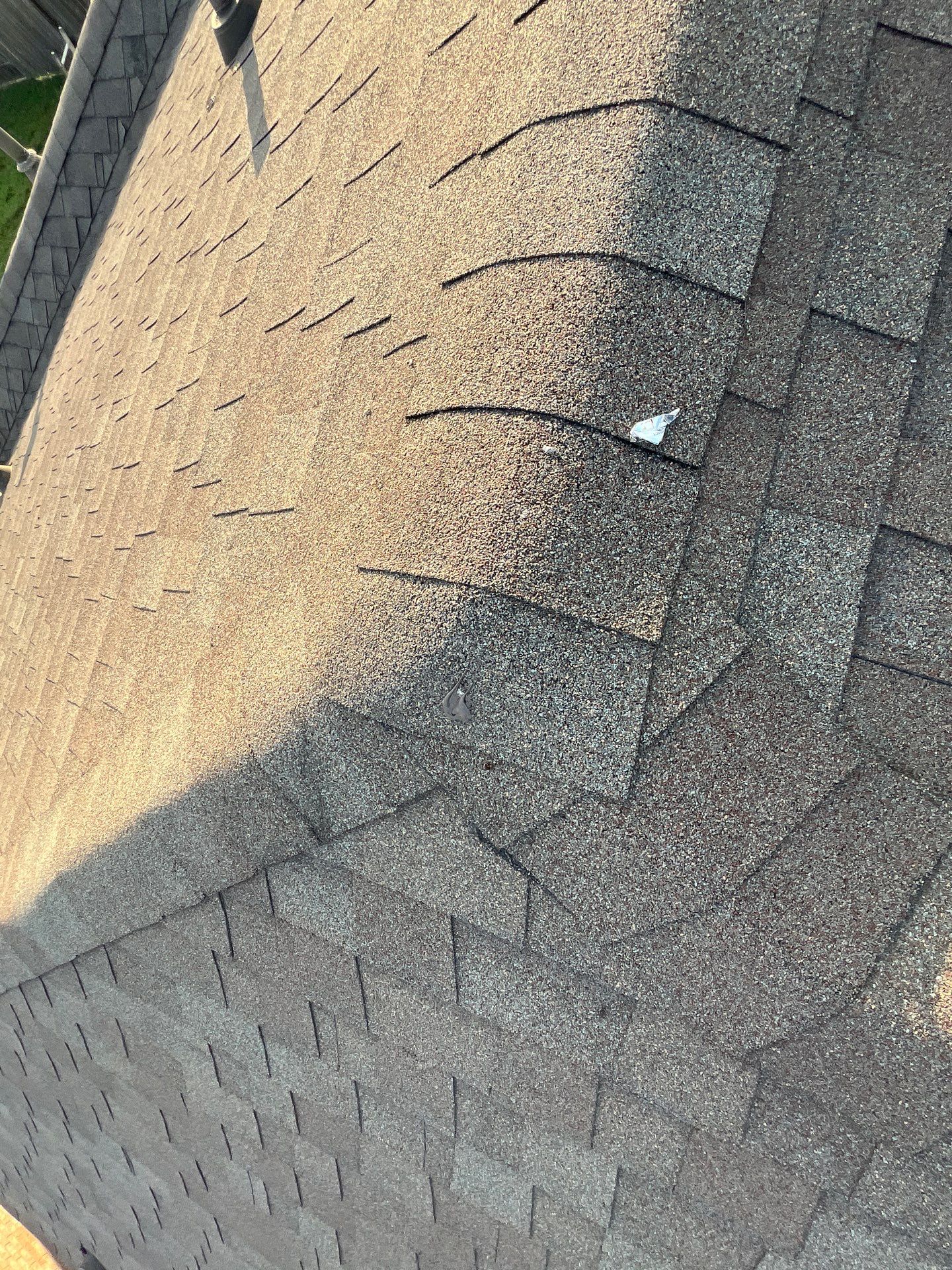 Hail Damage using Owen's Corning Duration (Lifetime) Shingles by Roof Repair Company