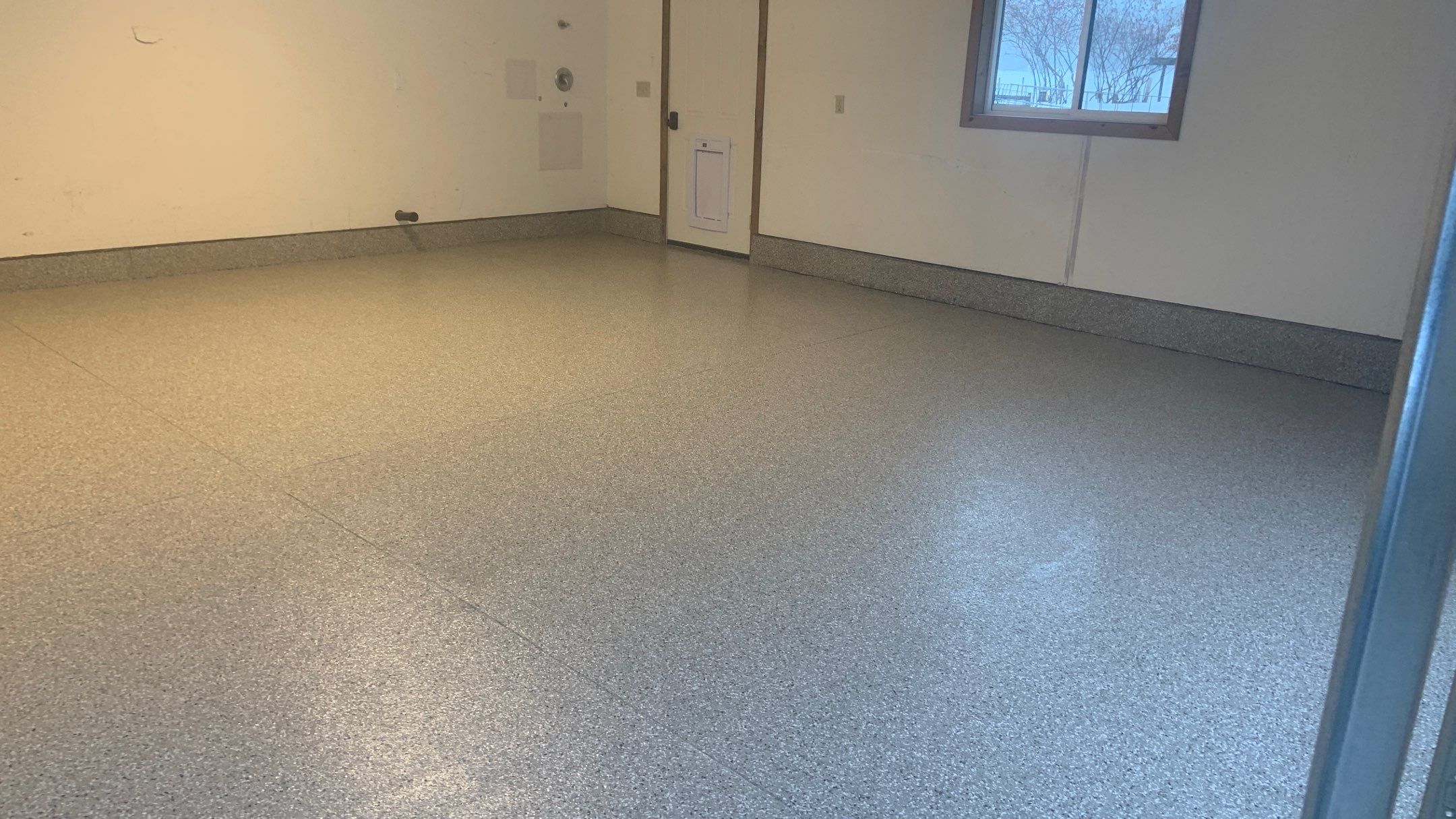 Garage Transformation using Pebble Beach by Croc Coatings, LLC