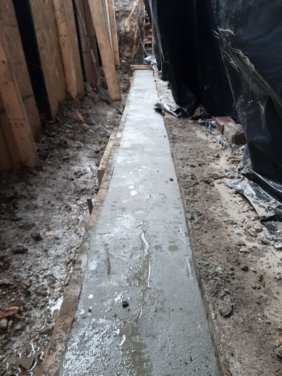 Basement Wall Rebuild with Exterior Waterproofing by Toledo Basement Repair