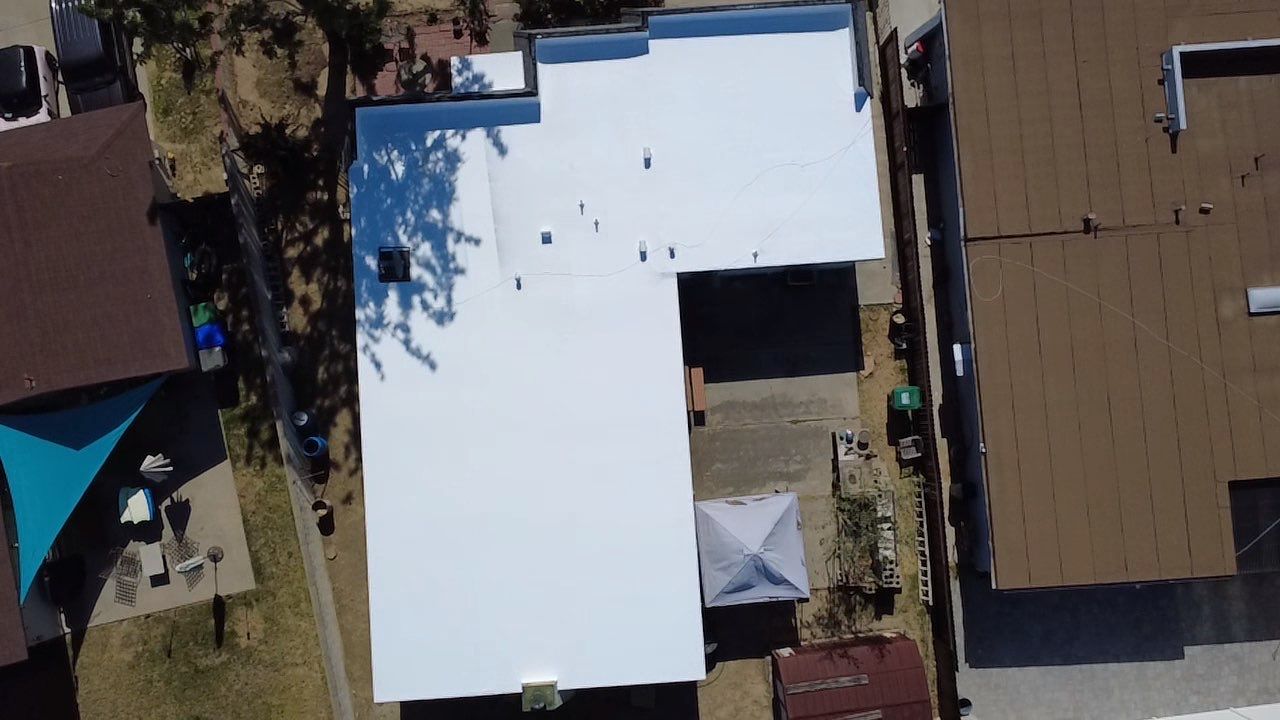 Oceanside Mansard TPO & Shingle Roof Replacement by Zenith Roofing Services