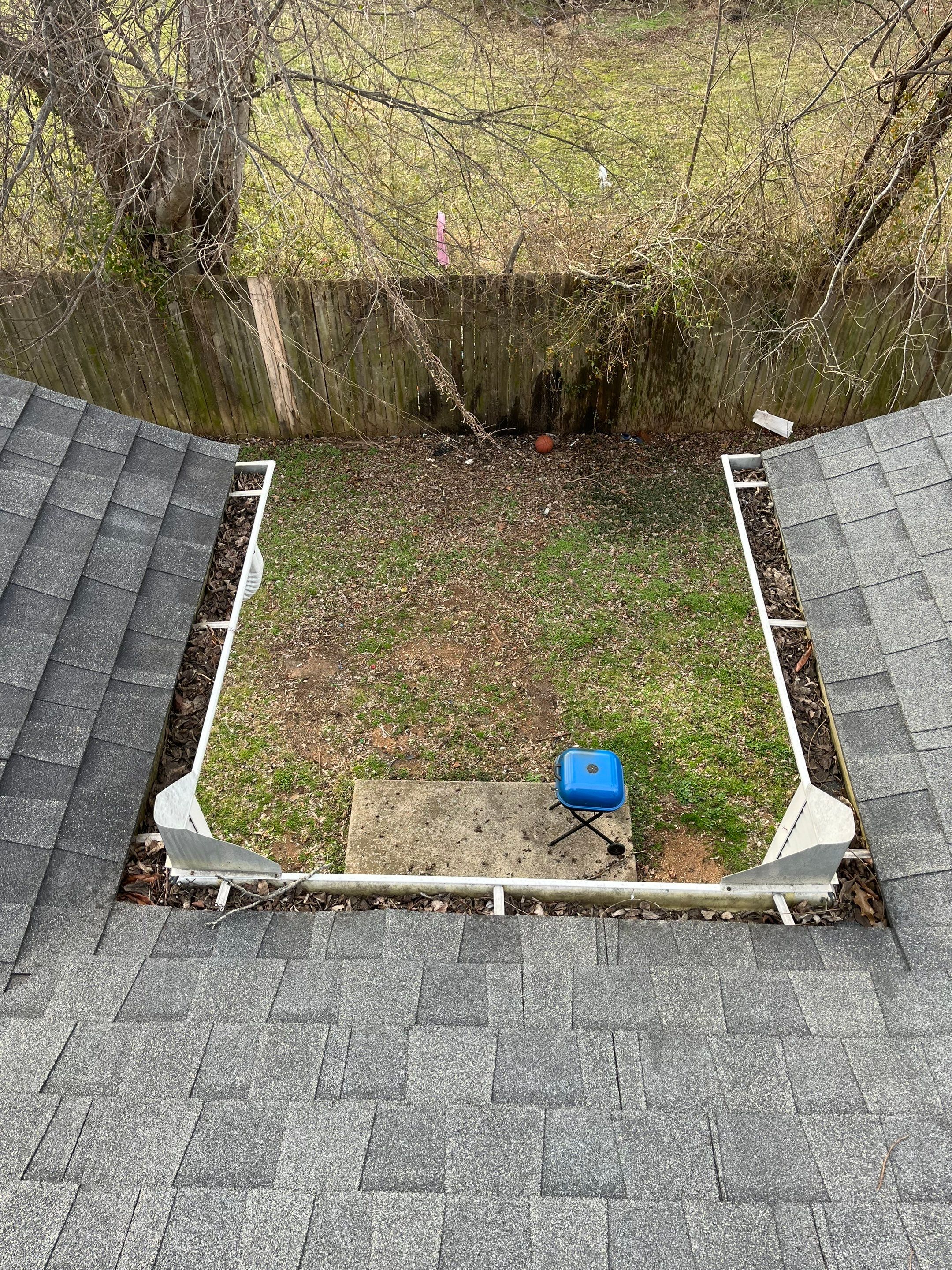 Commercial gutter cleaning Franklin & Murfreesboro before photo with filled gutters