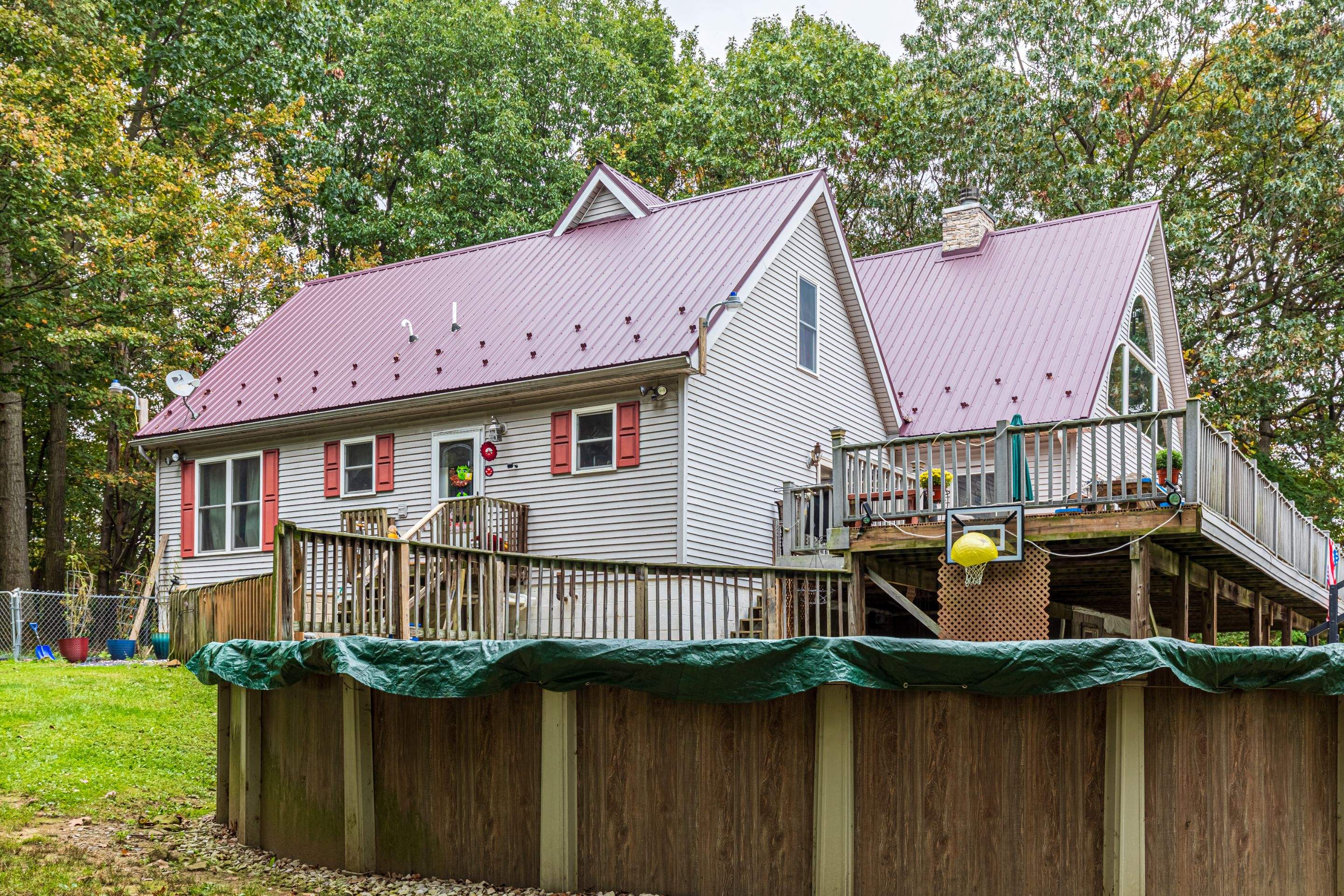 Metal Roof-burgundy by Esh Builders