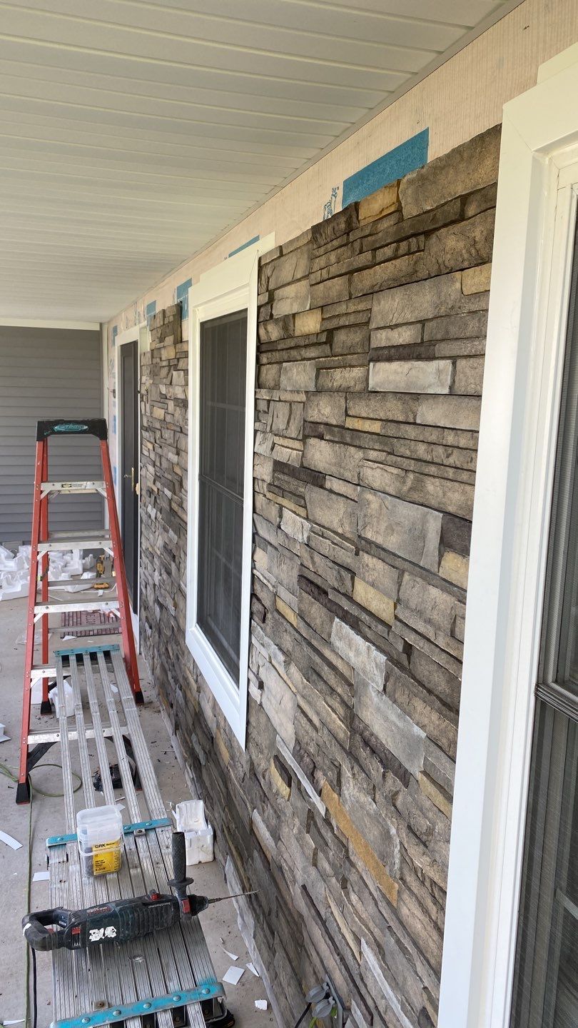 Siding Installation using Certainteed Monogram Charcoal gray and Owens Corning Versetta Stone Sterling by A Plus Exterior