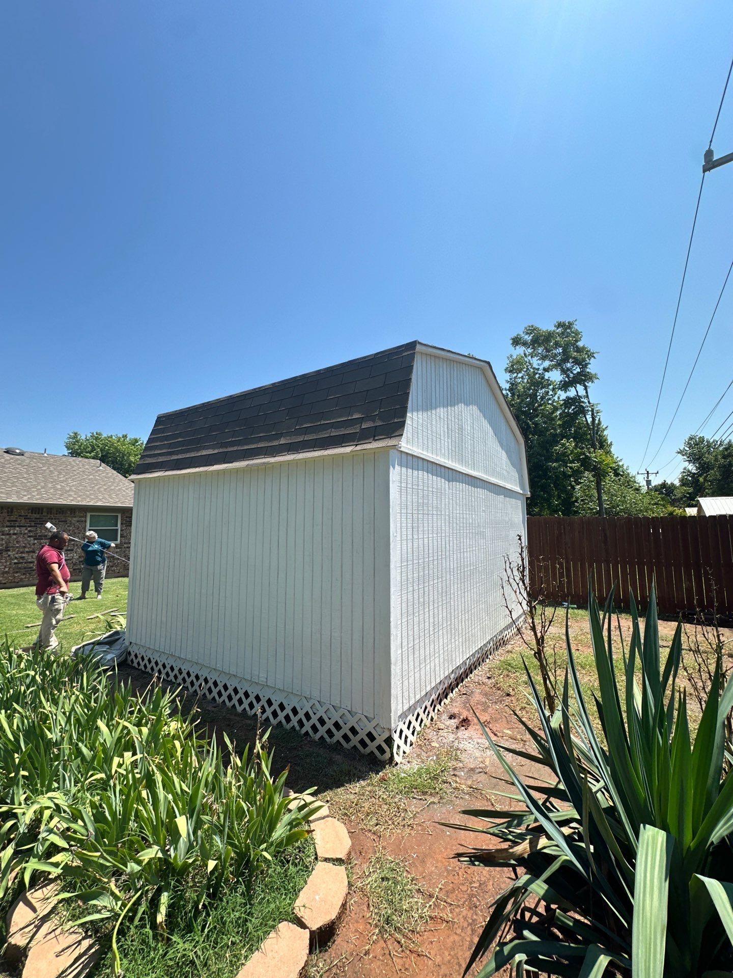 barn roof repair and solar tube replacement in Mustang by McCann's Roofing and Construction