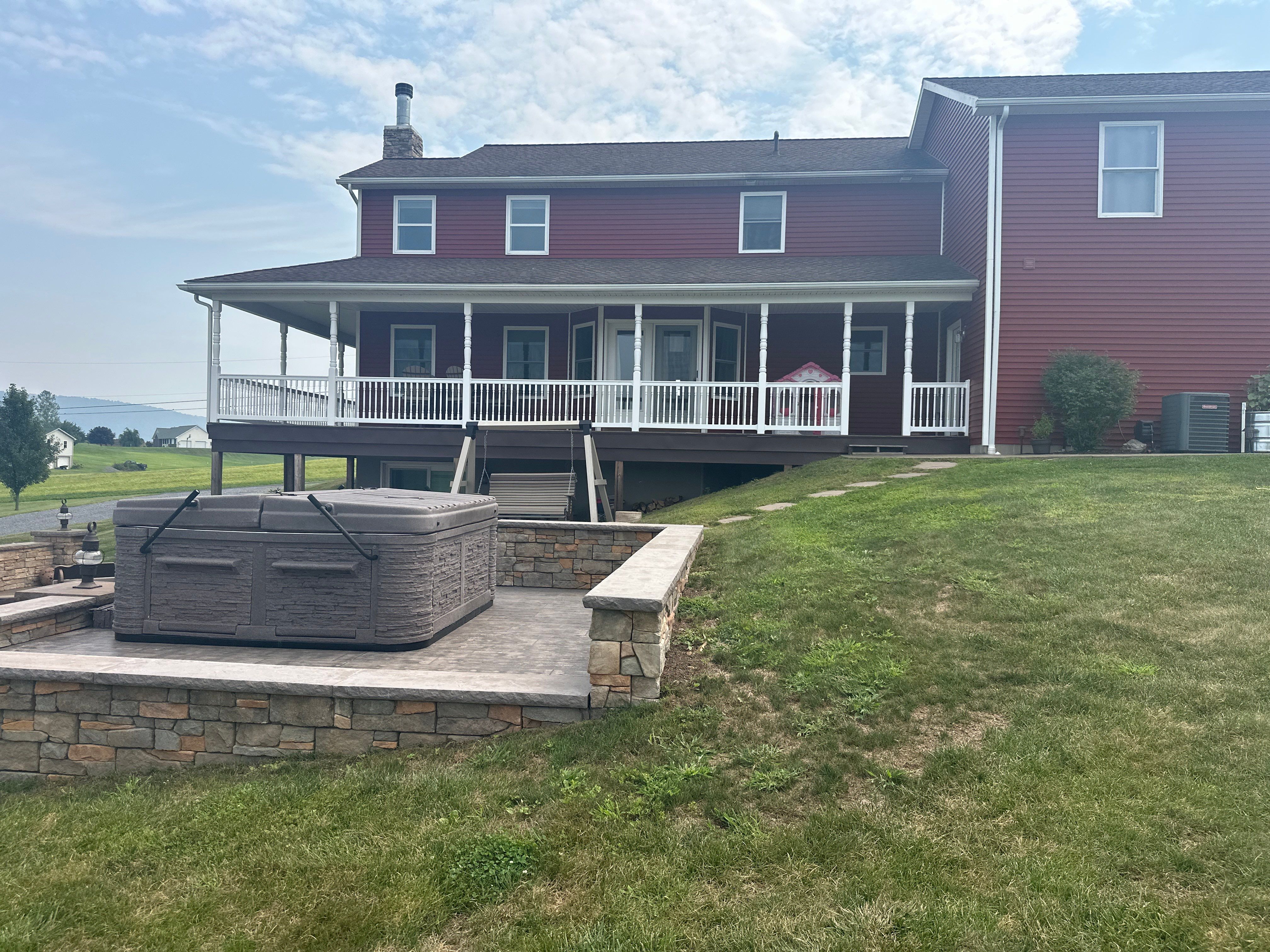 Covered Deck Addition With Custom Gable Roof in Tower City by Esh Builders