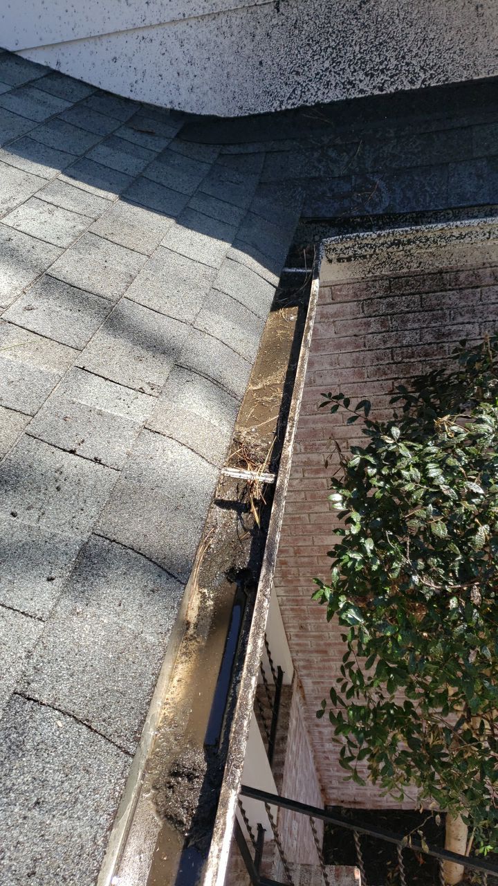 Gutter Cleaning using water by Power Wash Masters LLC